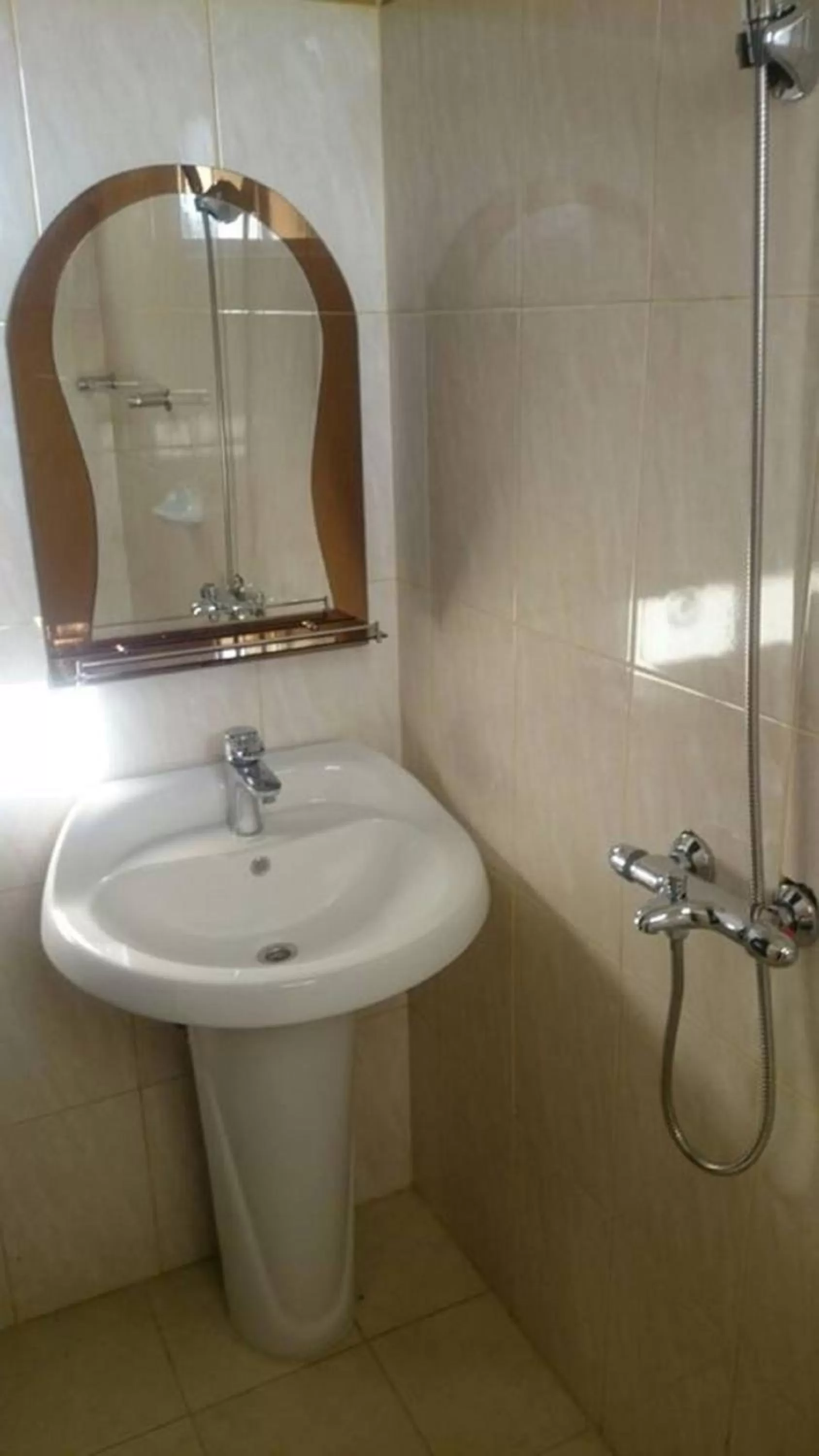 Bathroom in Itetemia Royal Inn