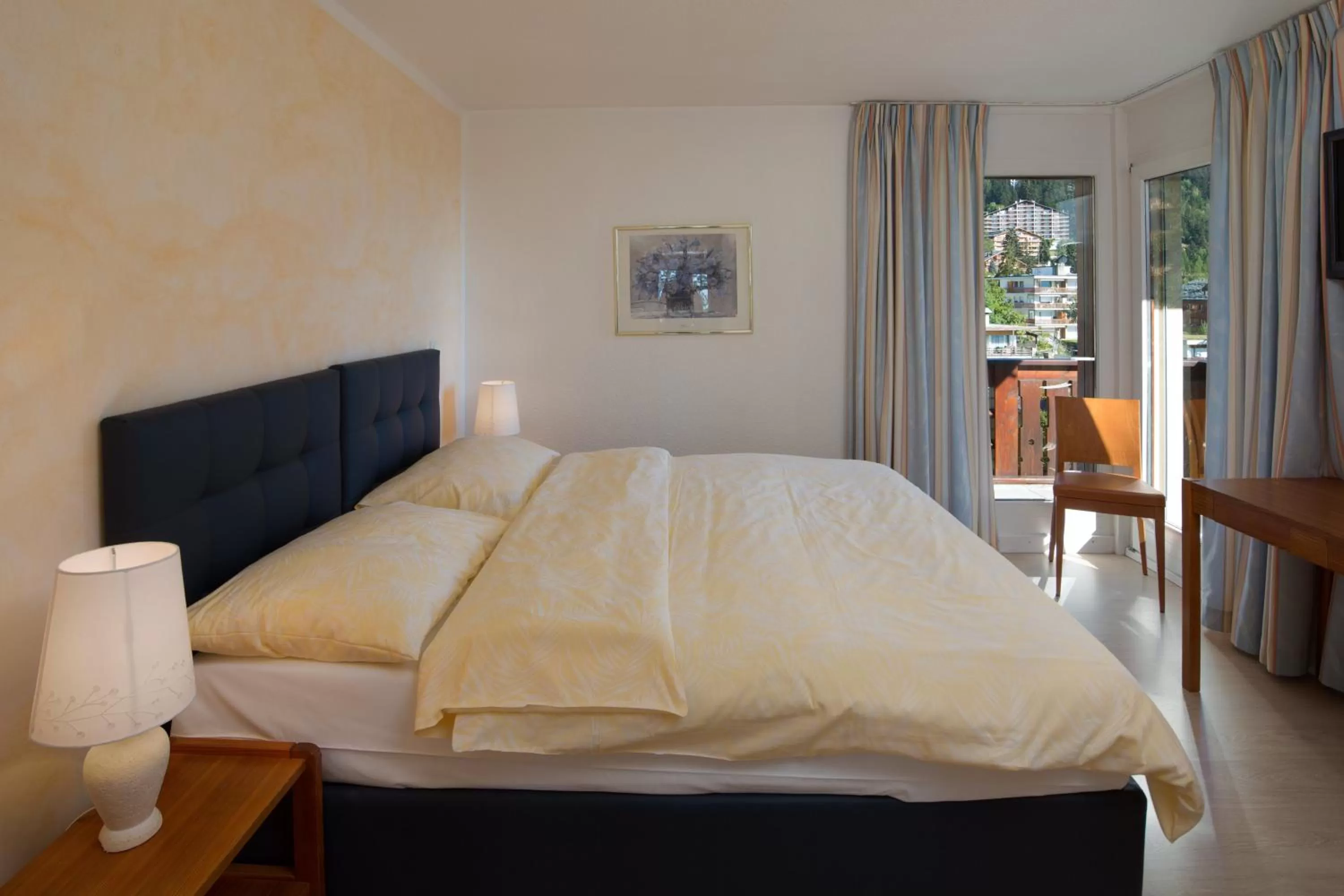 Bed in Aparthotel Helvetia