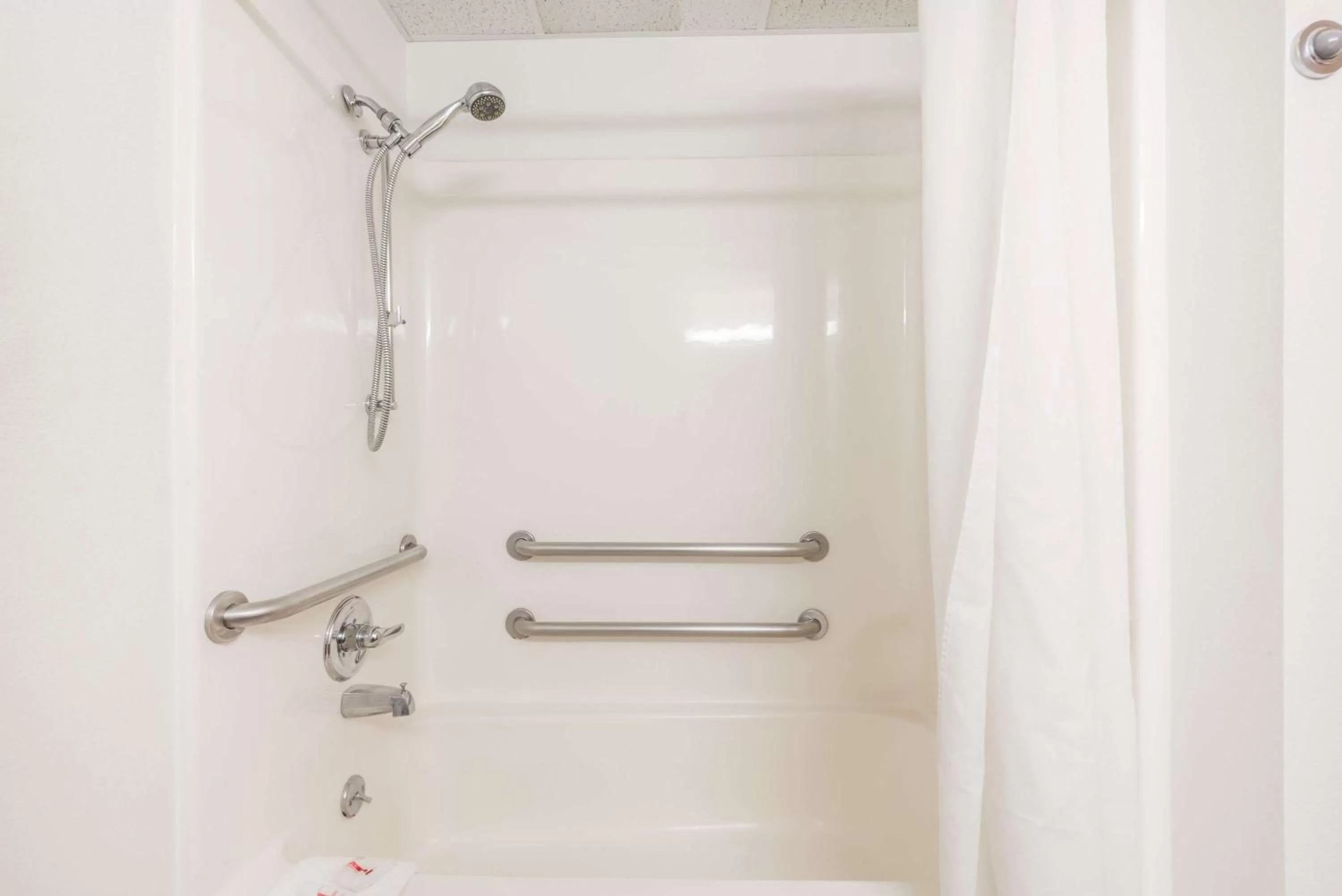 Bathroom in Super 8 by Wyndham Independence KS