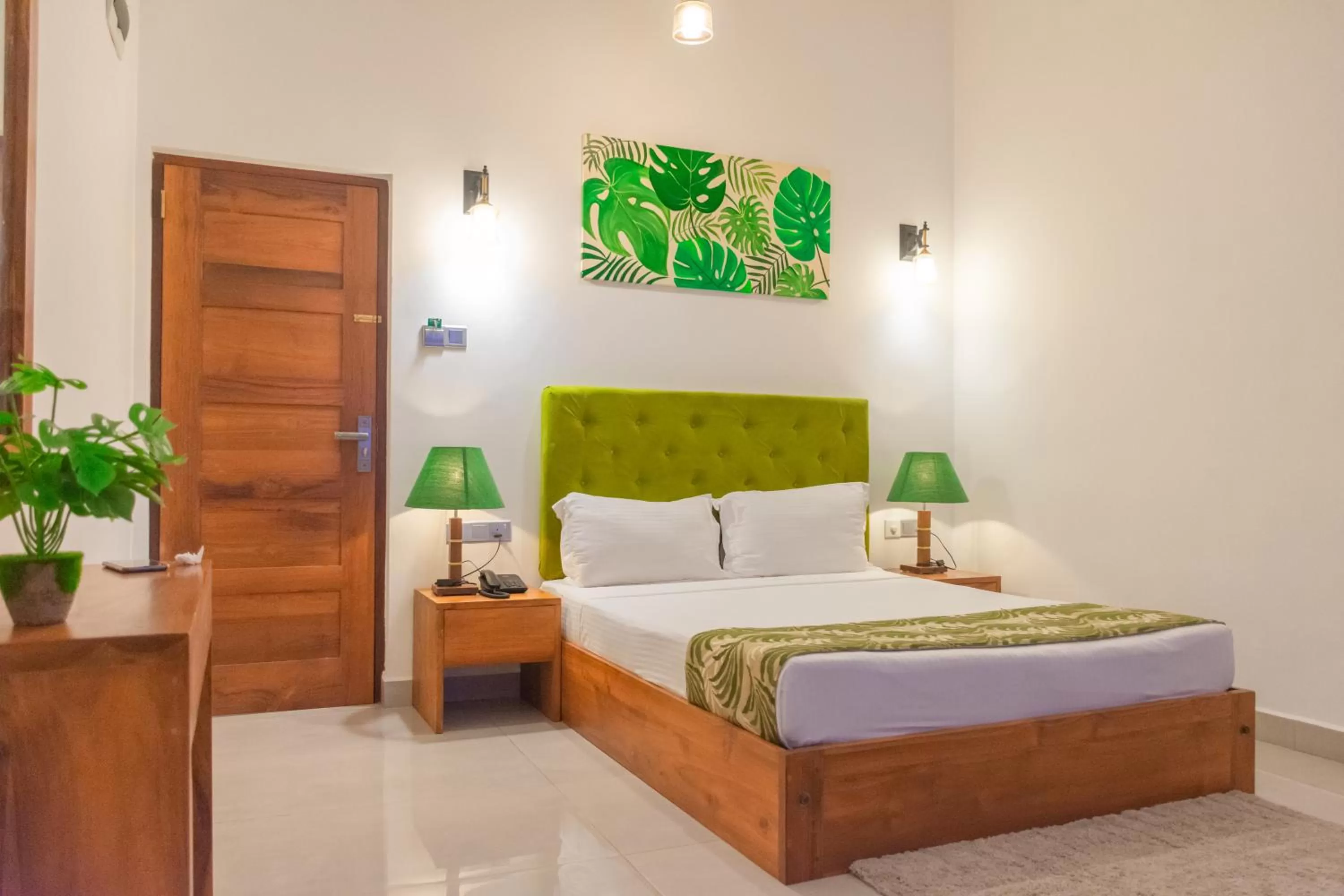 Bed in J leaf Hotel by Blue Bird