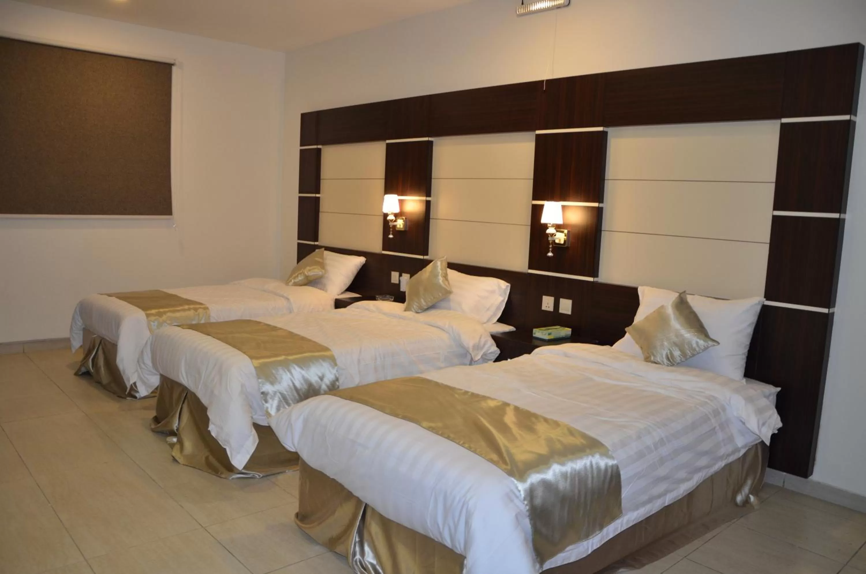 Bed in Jazan Heart Hotel