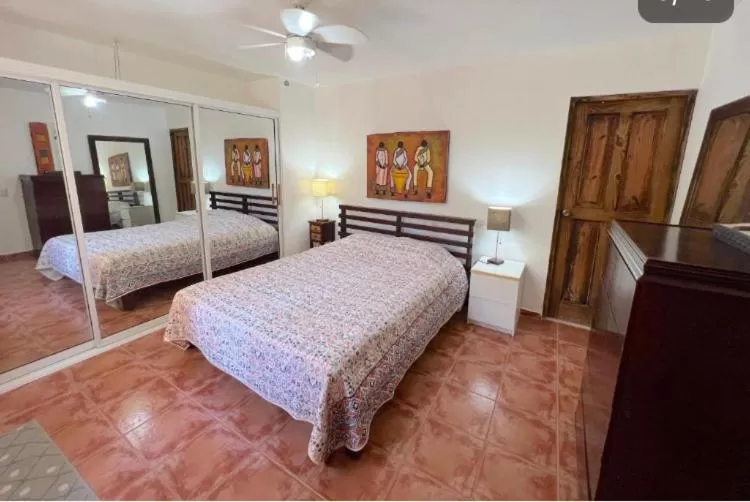 Bed in Los Corales Luxury Villas Beach Club and Spa