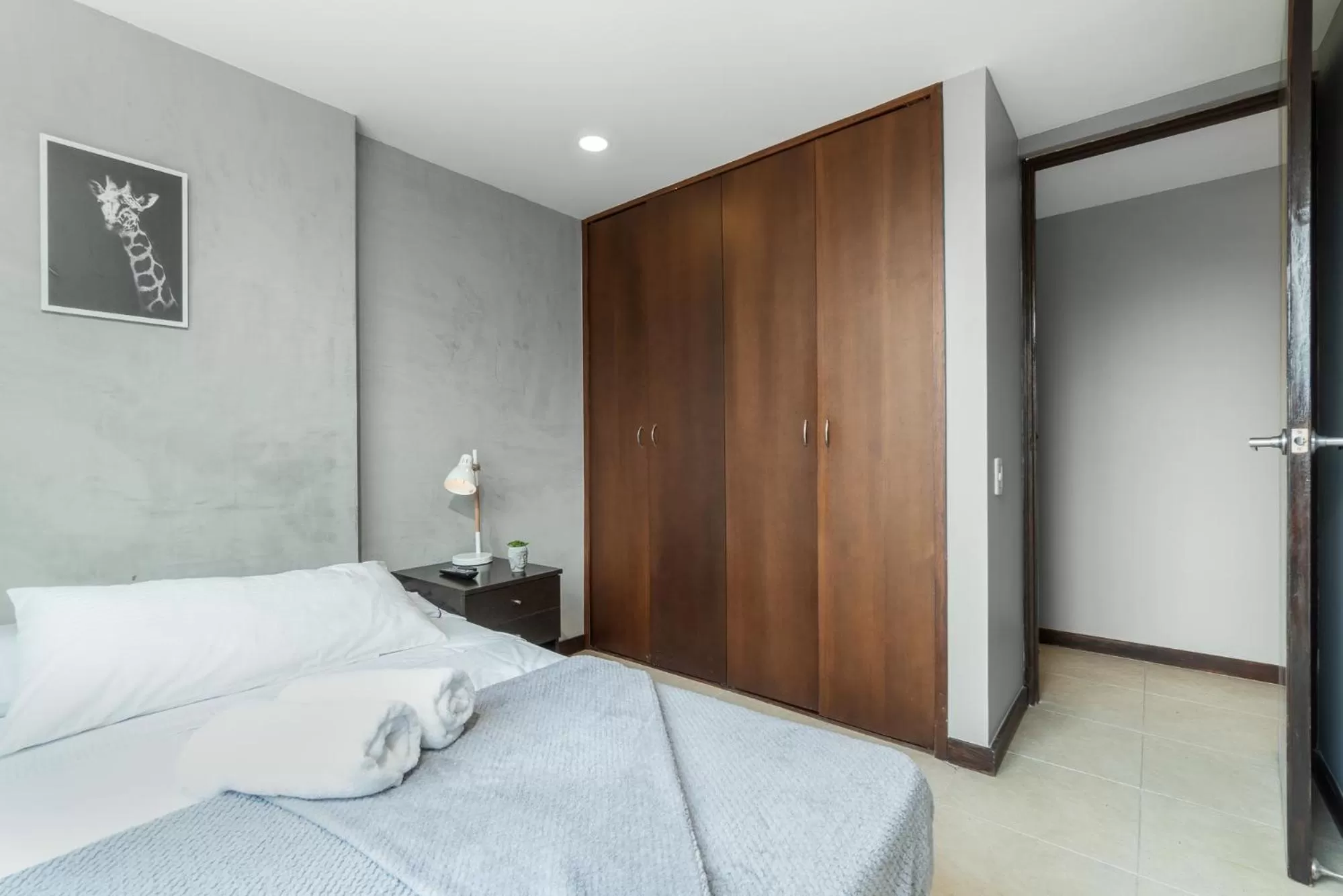 Bed in Apartamentos Poblado Alejandría by HOUSY HOST