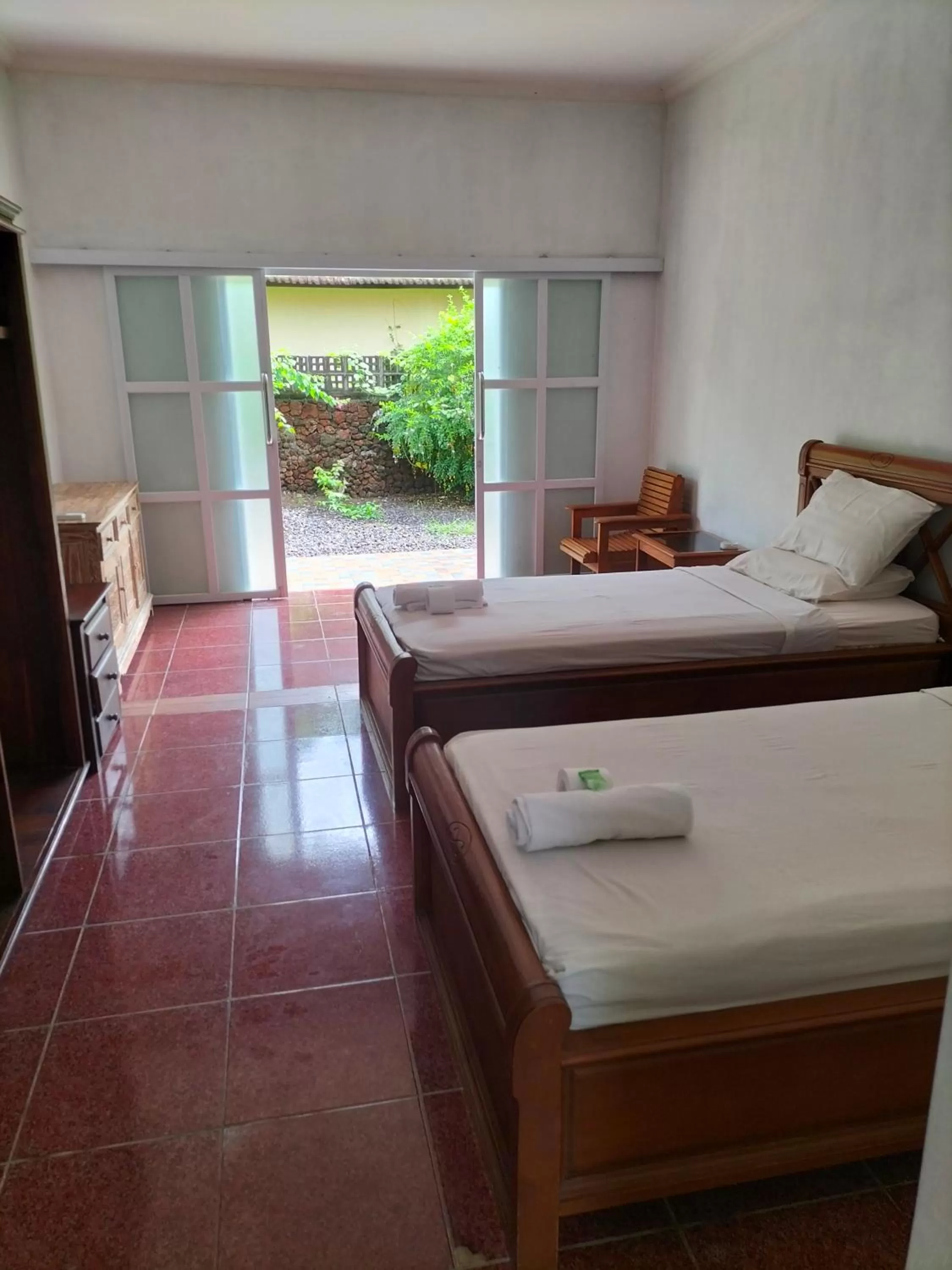 Bed in Nirwana Sea Side Cottages