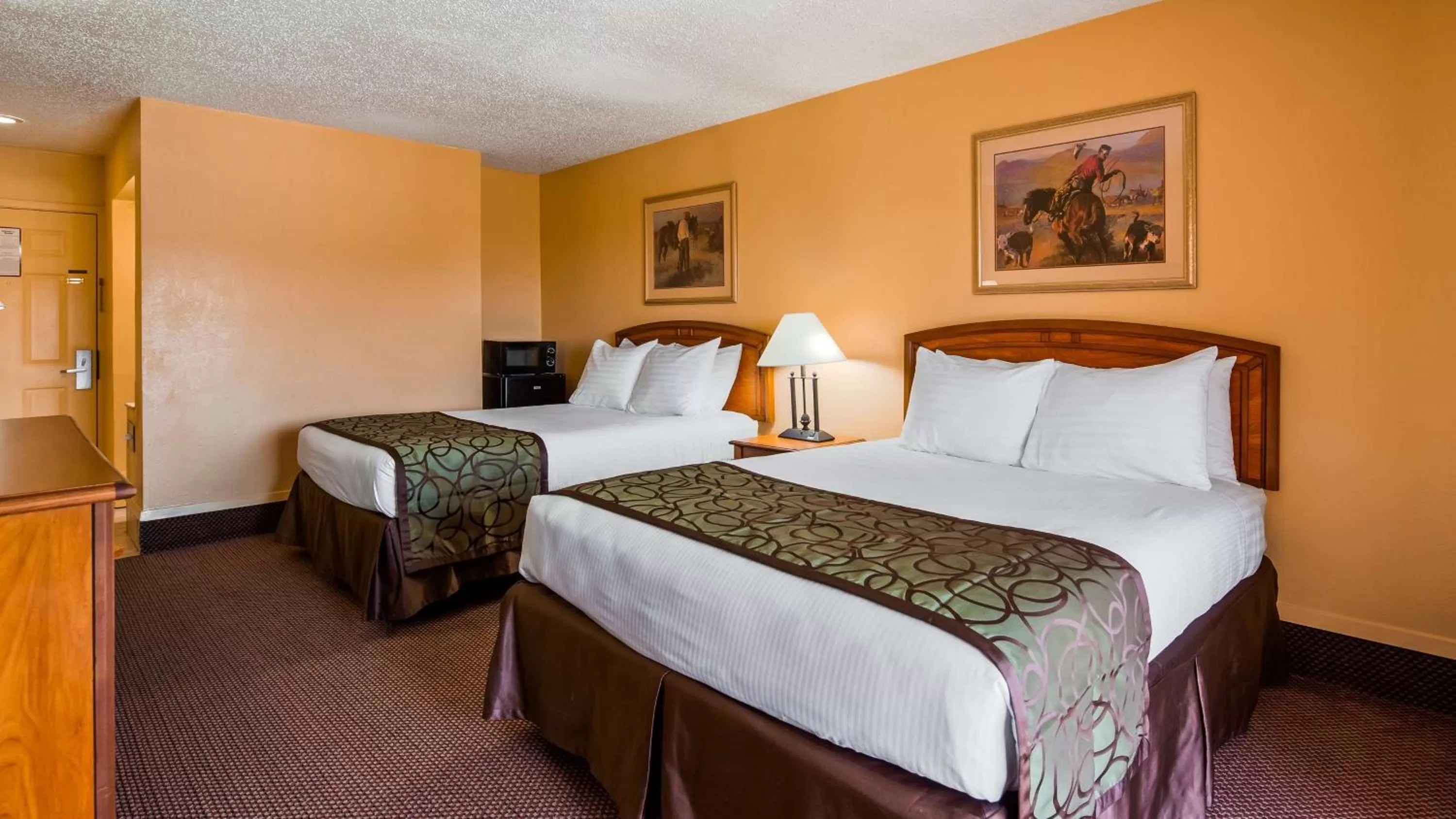 Queen Room with Two Queen Beds - Poolside/Non-Smoking in Best Western Trail Dust Inn & Suites