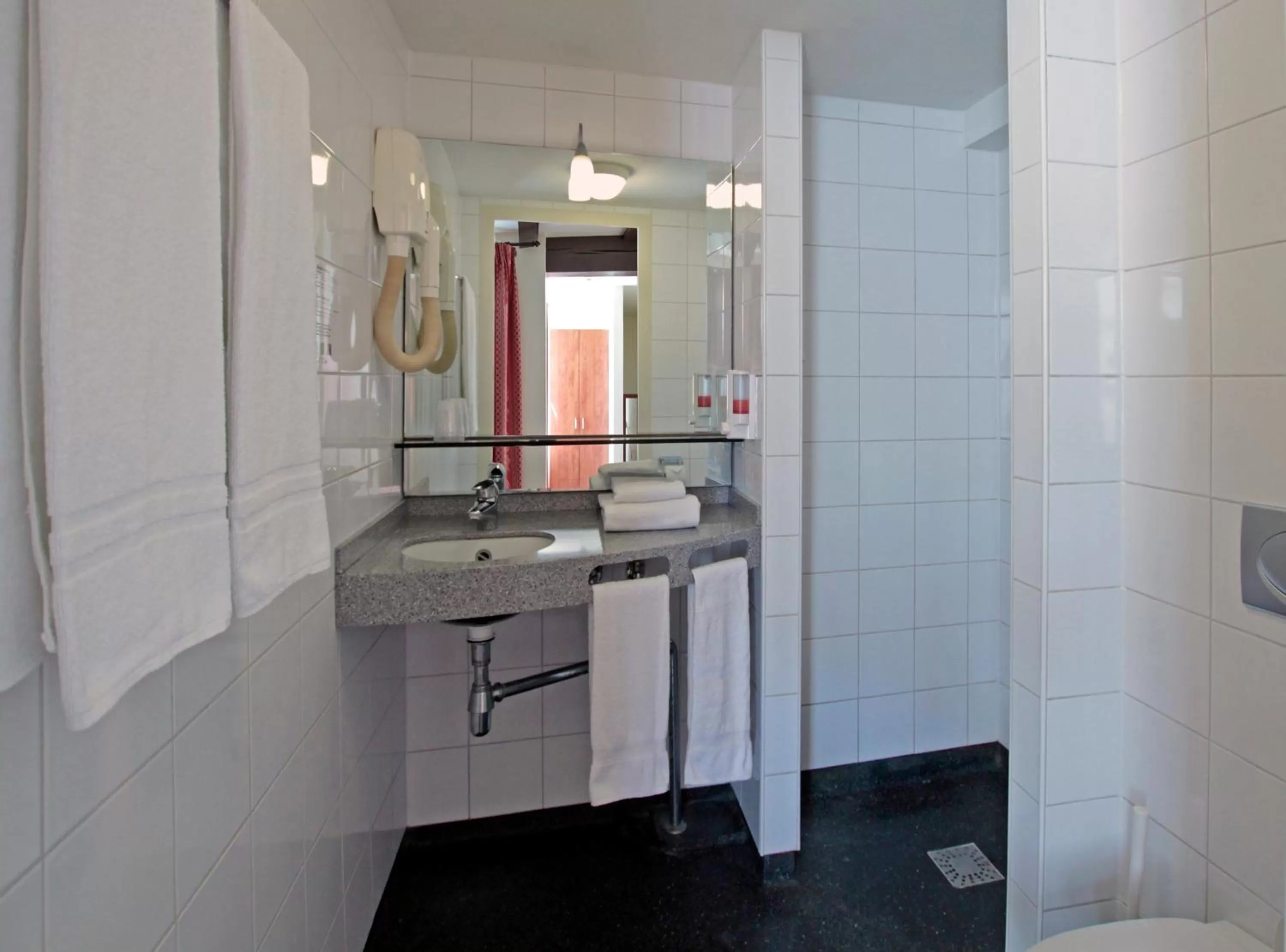 Bathroom in A-Train Hotel