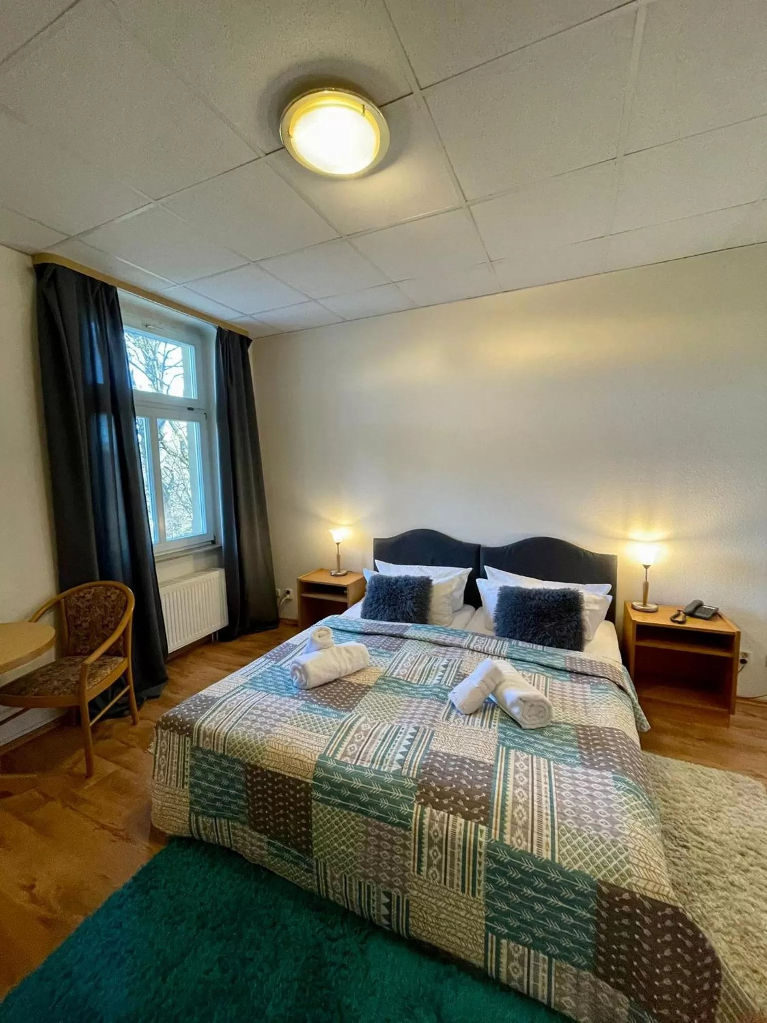 Photo of the whole room, Bed in Parkhotel Waldschlösschen