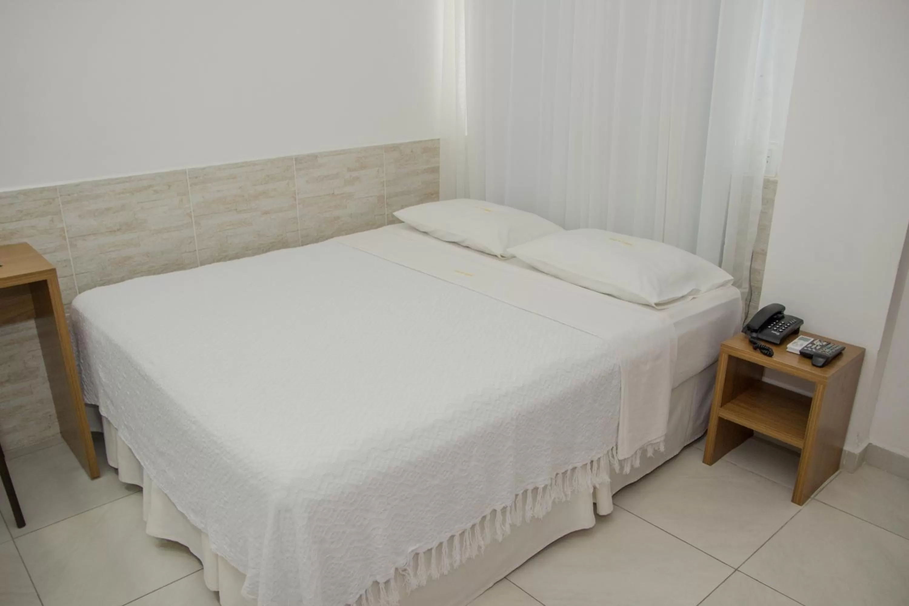 Bed in Hotel Costa do Atlântico