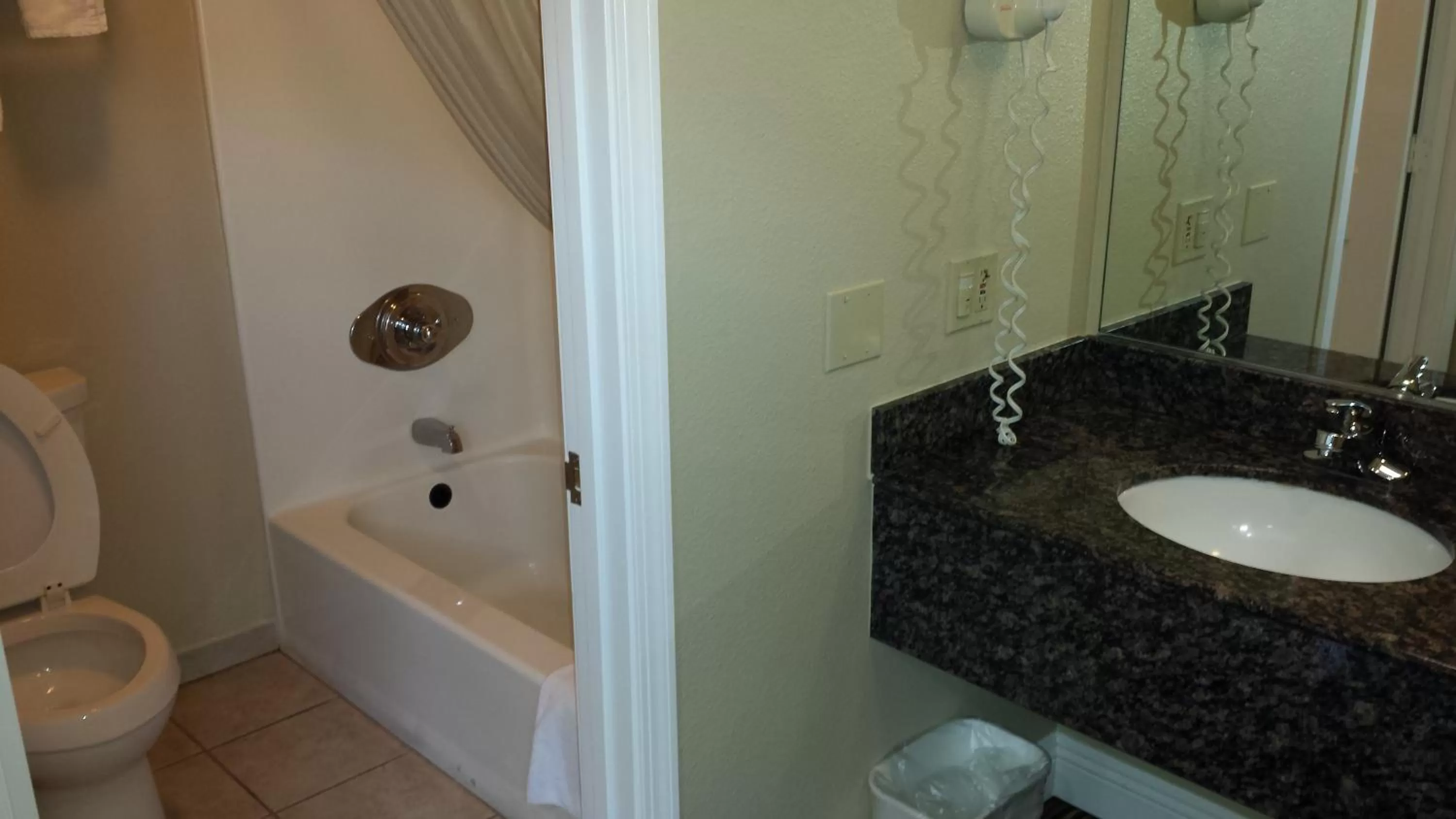 Bathroom in Regency Hotel - Moreno Valley