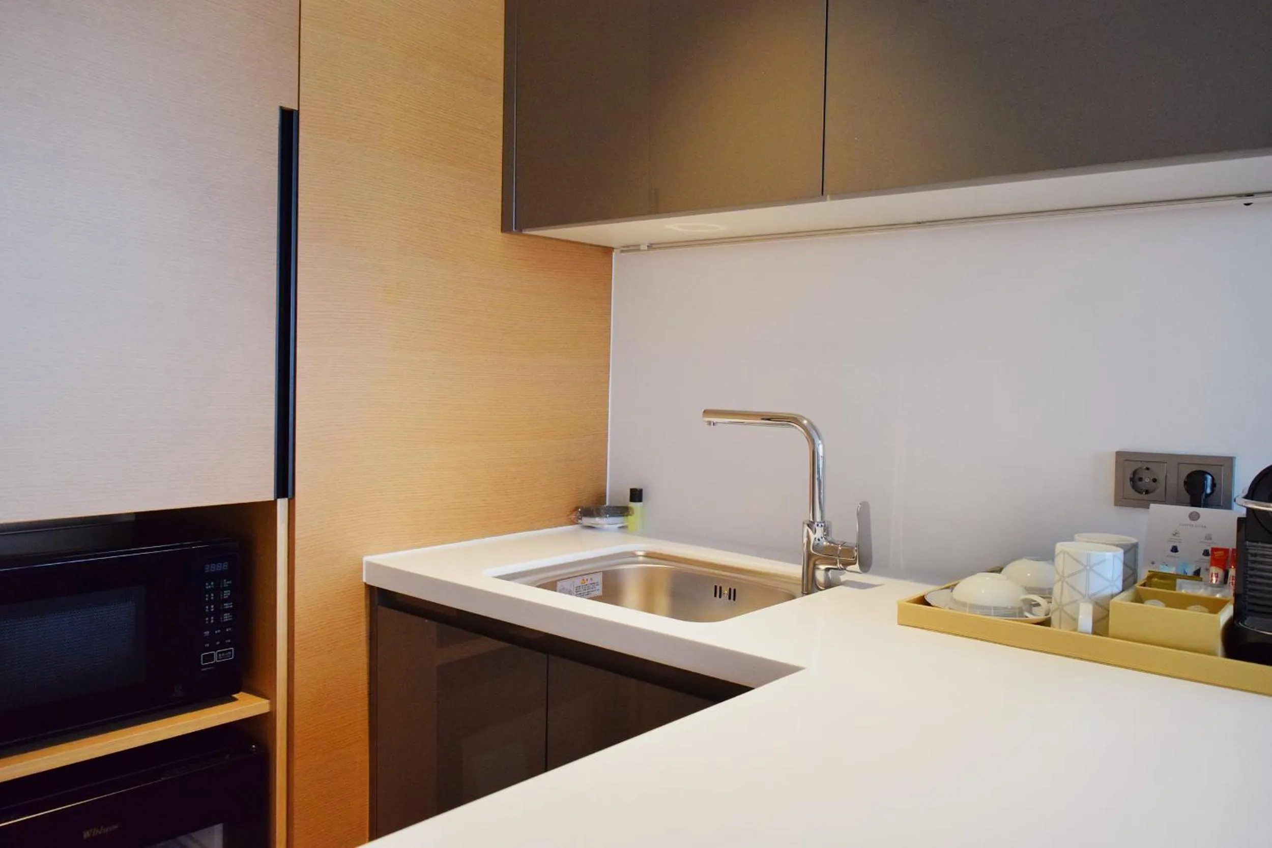 Kitchen or kitchenette in Novotel Suites Ambassador Seoul Yongsan