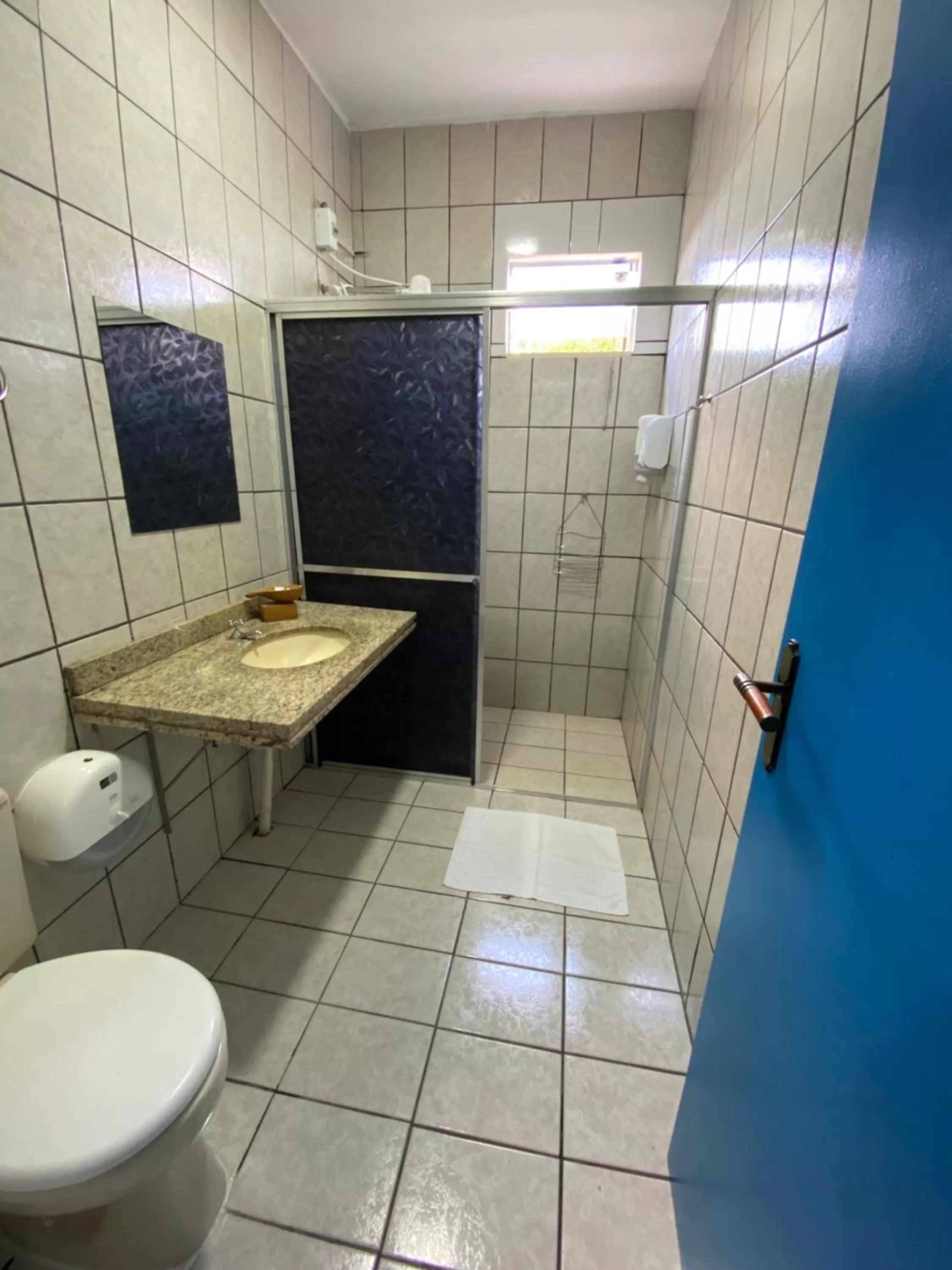 Bathroom in Pousada Cambará Suítes