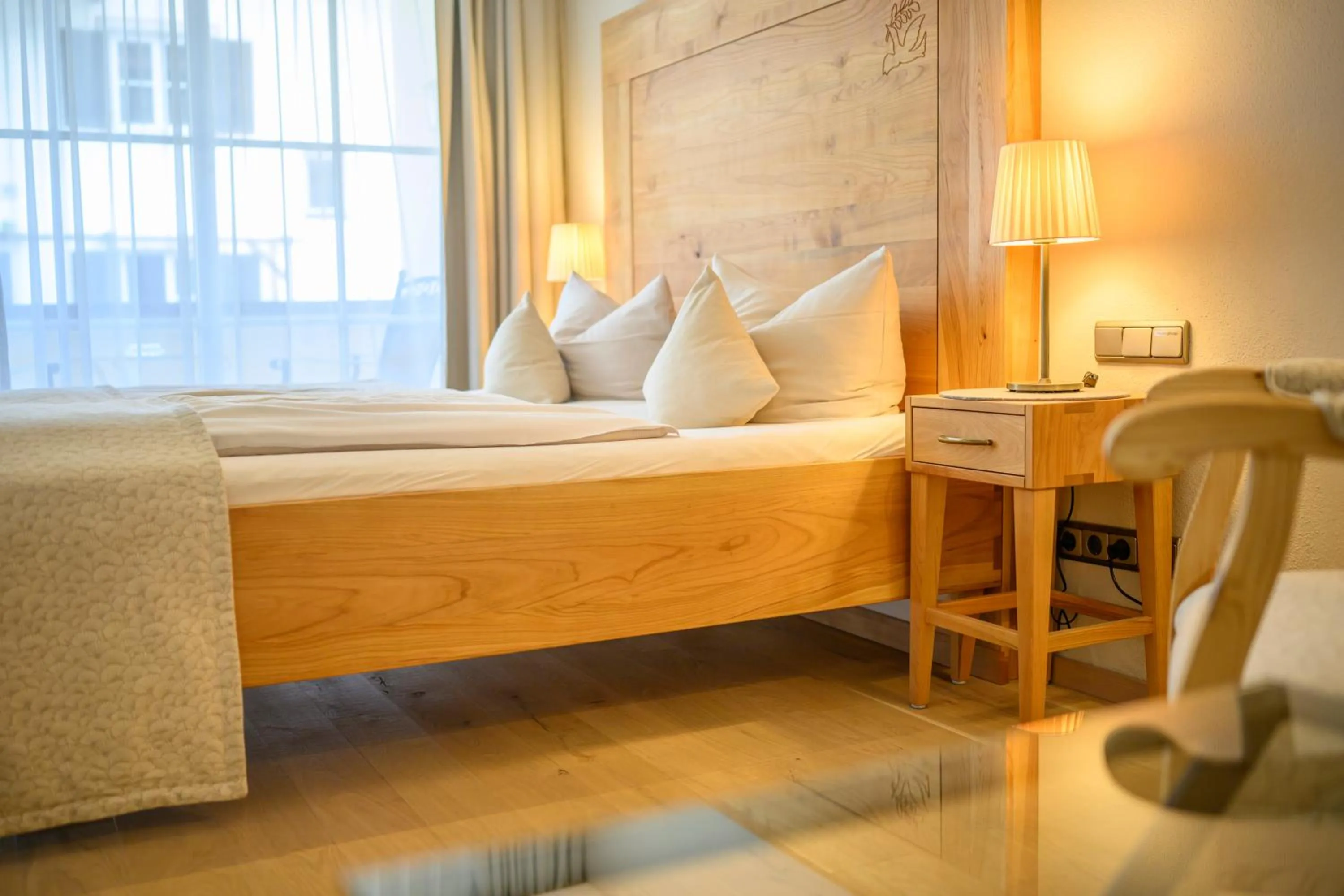 Photo of the whole room, Bed in Biohotel Garmischer Hof