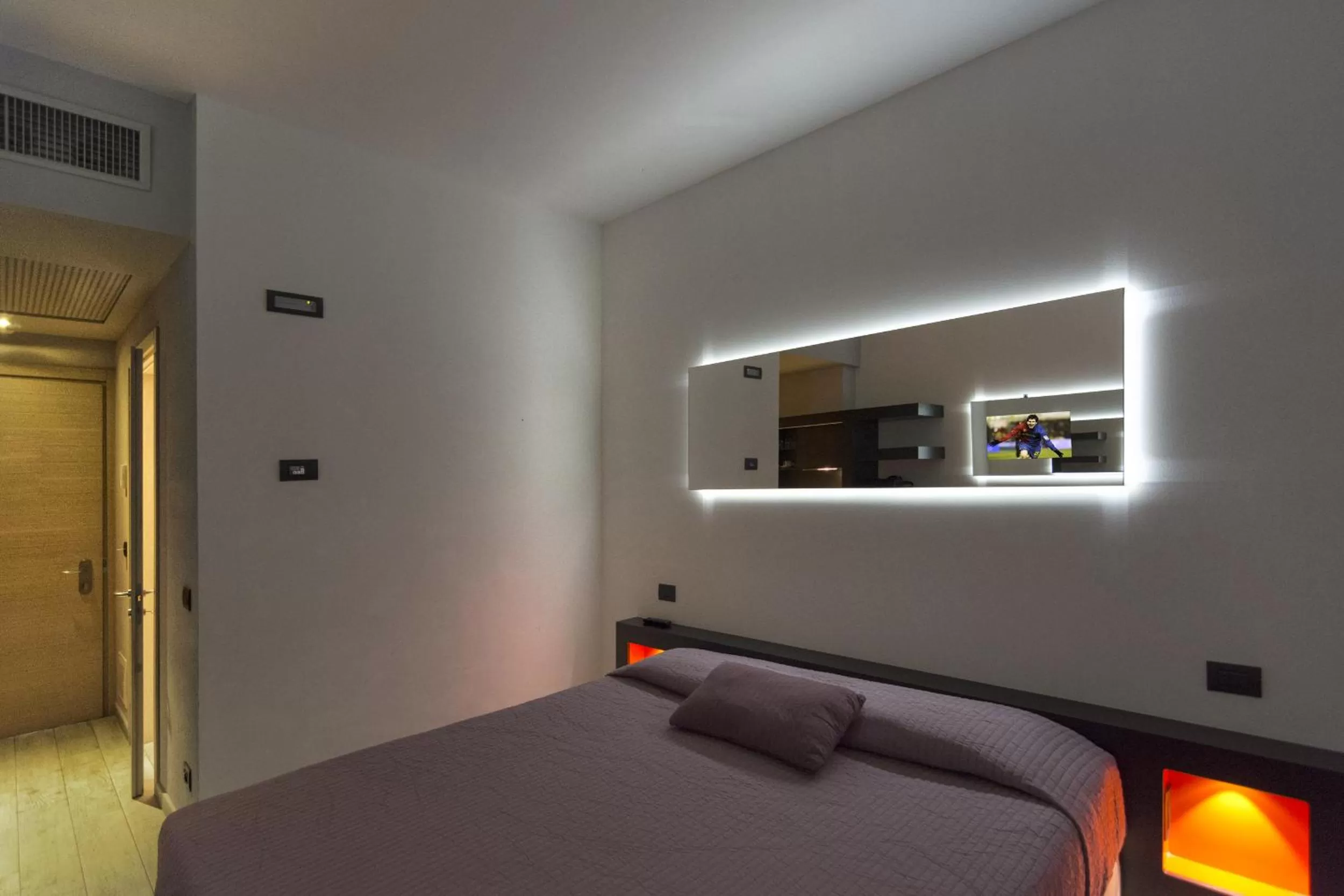 Bed in Blue Shades Hotel