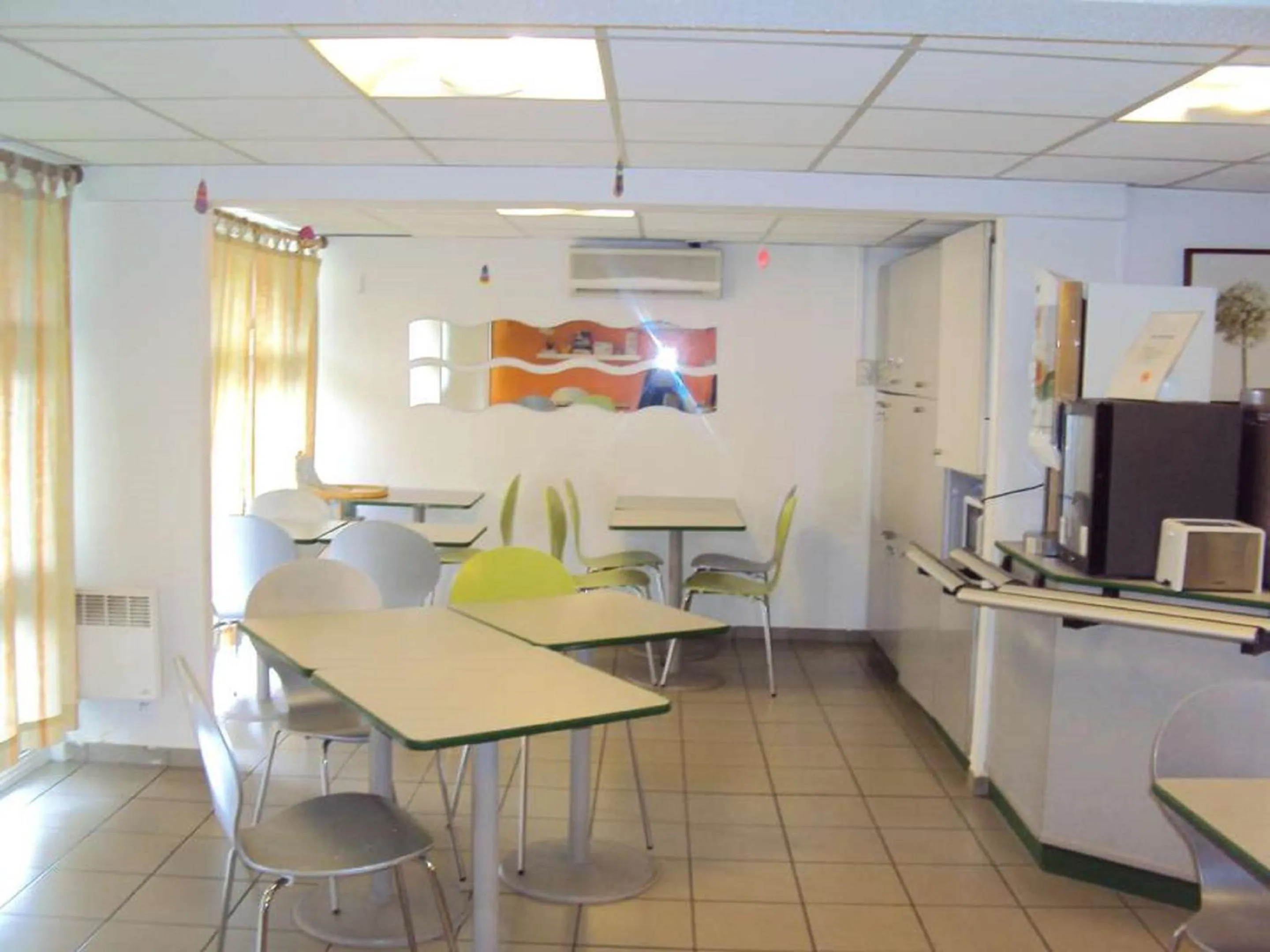 Lobby or reception in Premiere Classe St Etienne Nord Villars