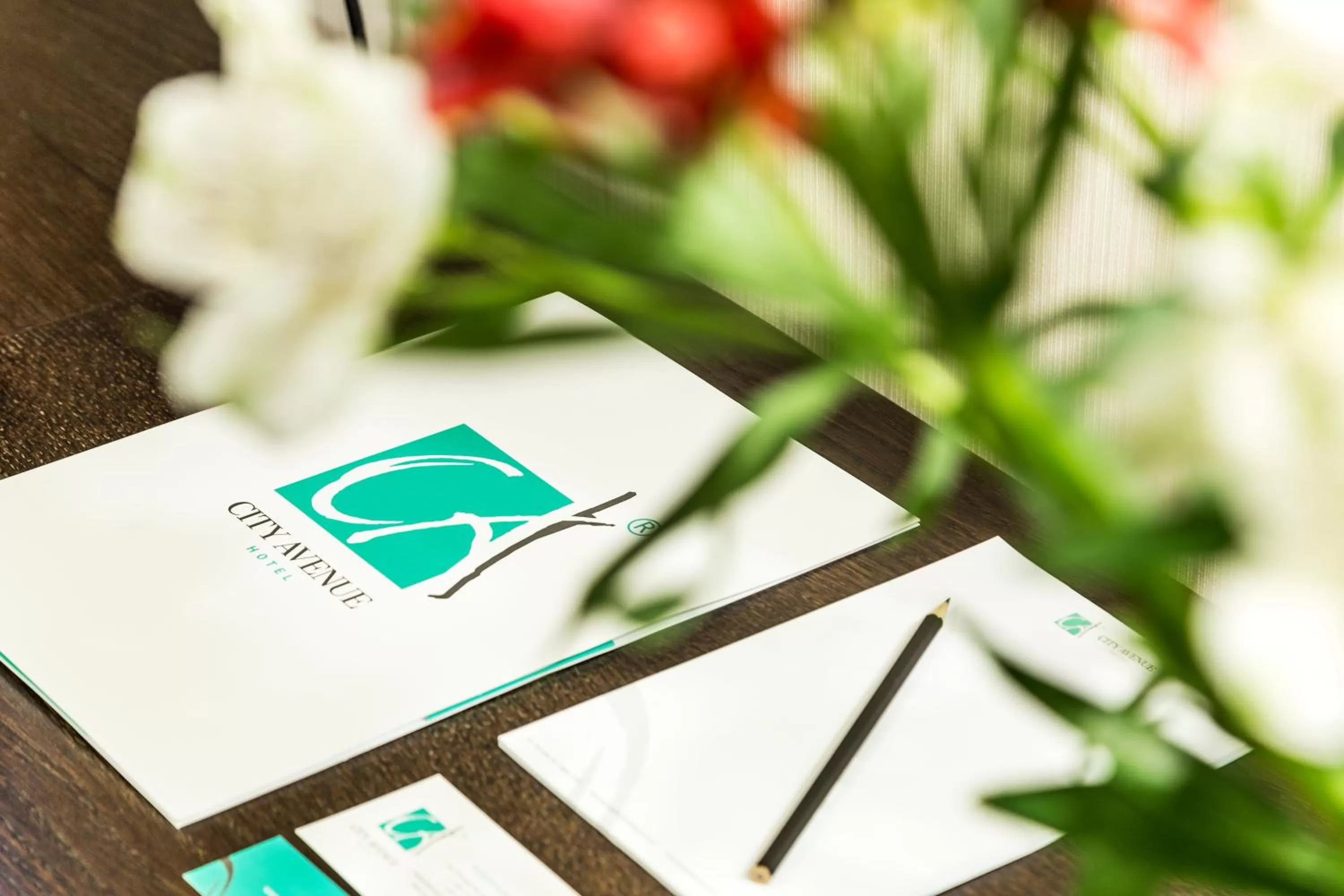 Property logo or sign in City Avenue Hotel