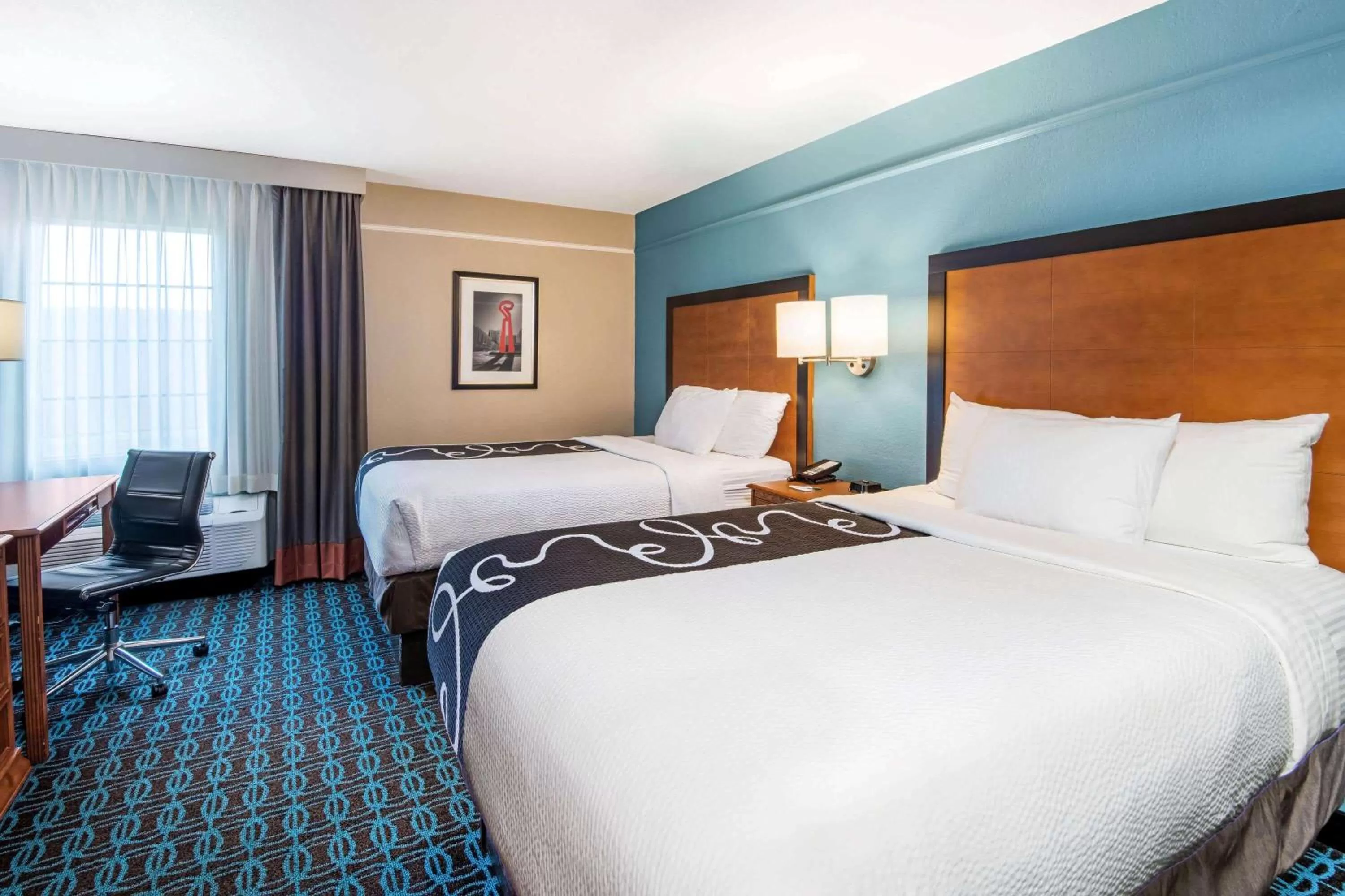 Photo of the whole room, Bed in La Quinta Inn by Wyndham San Antonio Brooks City Base