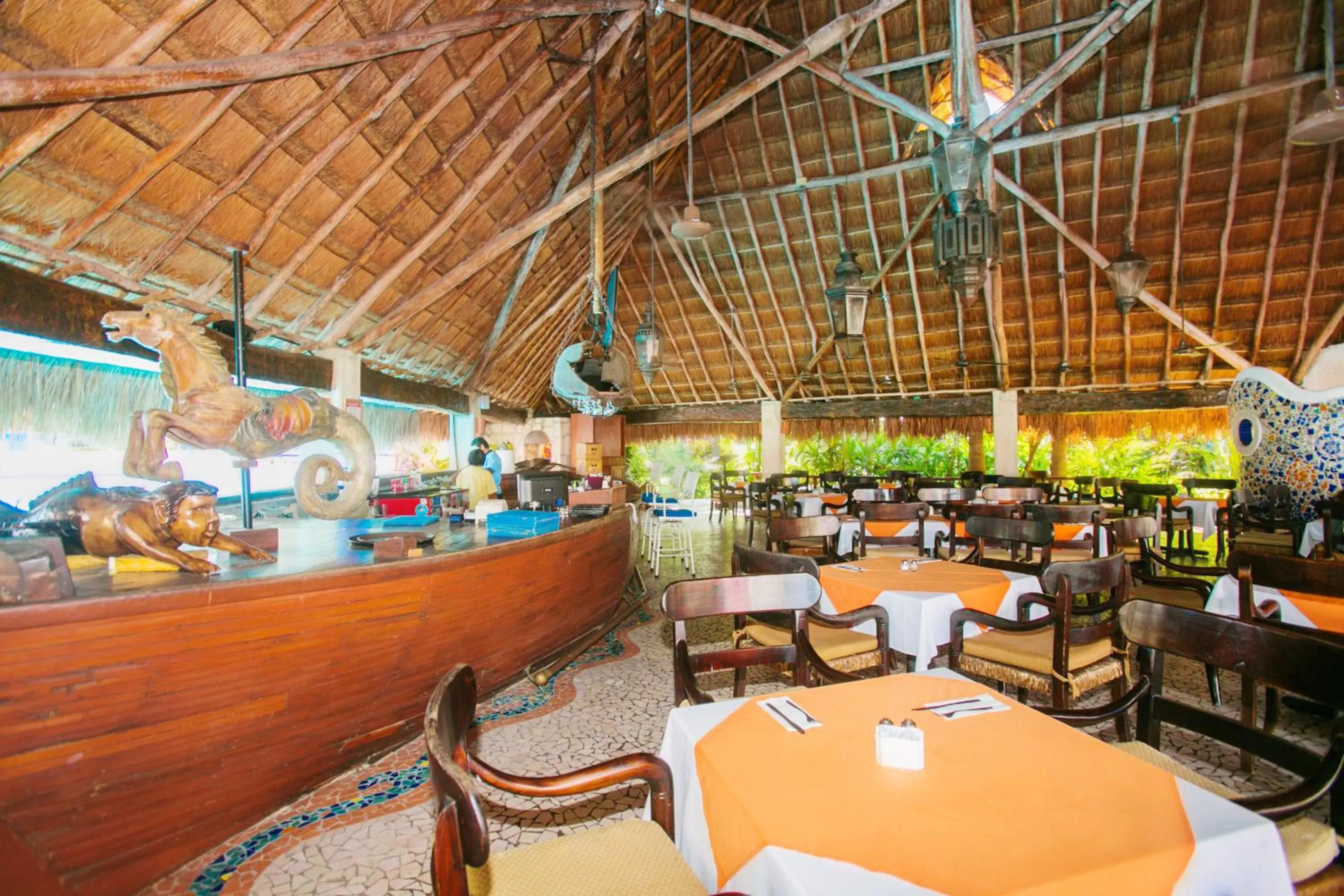 Restaurant/places to eat in Casa del Mar Cozumel Hotel & Dive Resort with free access to an exclusive beach club