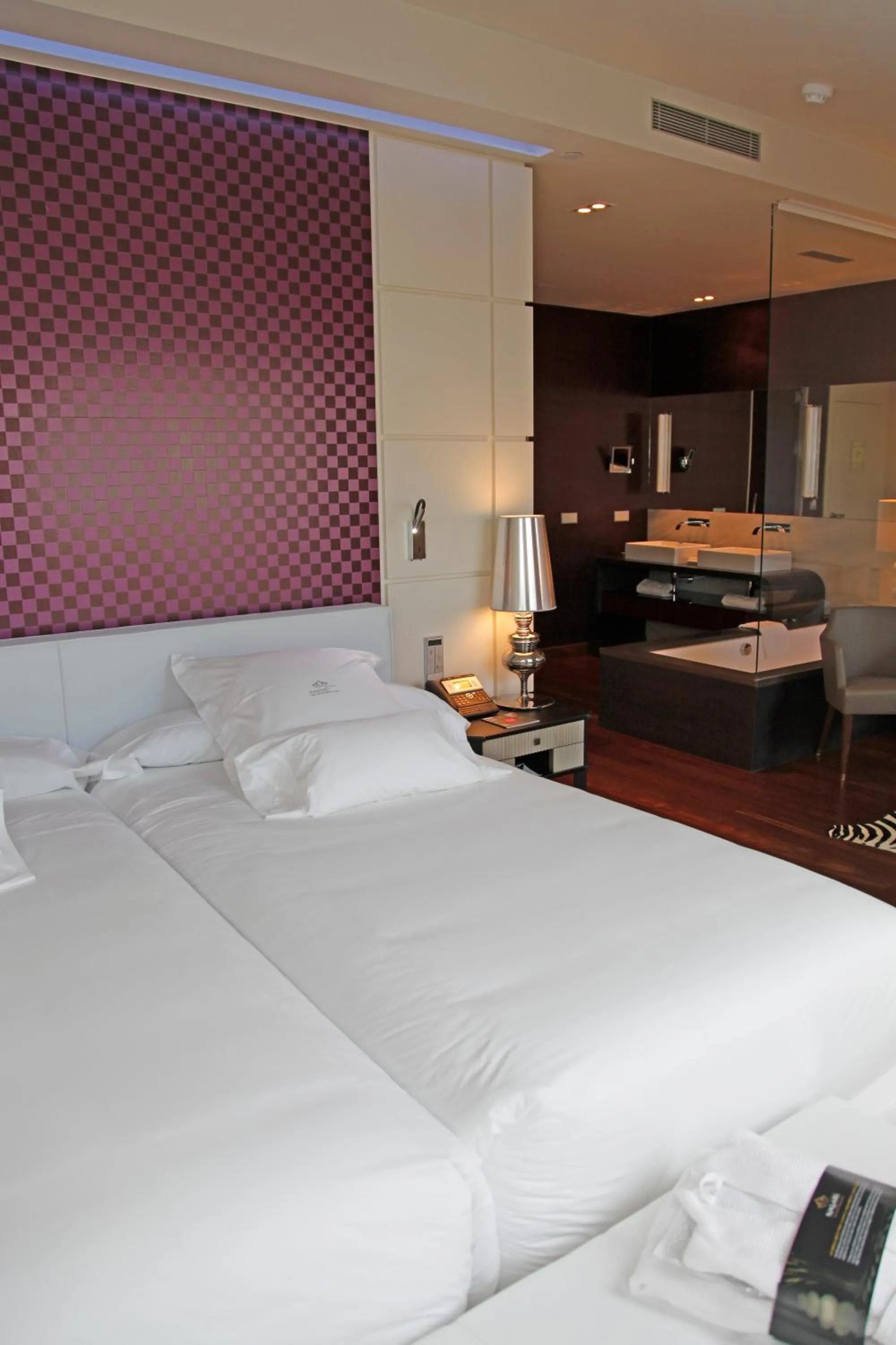 Bed in Gran Hotel Nagari Boutique & Spa