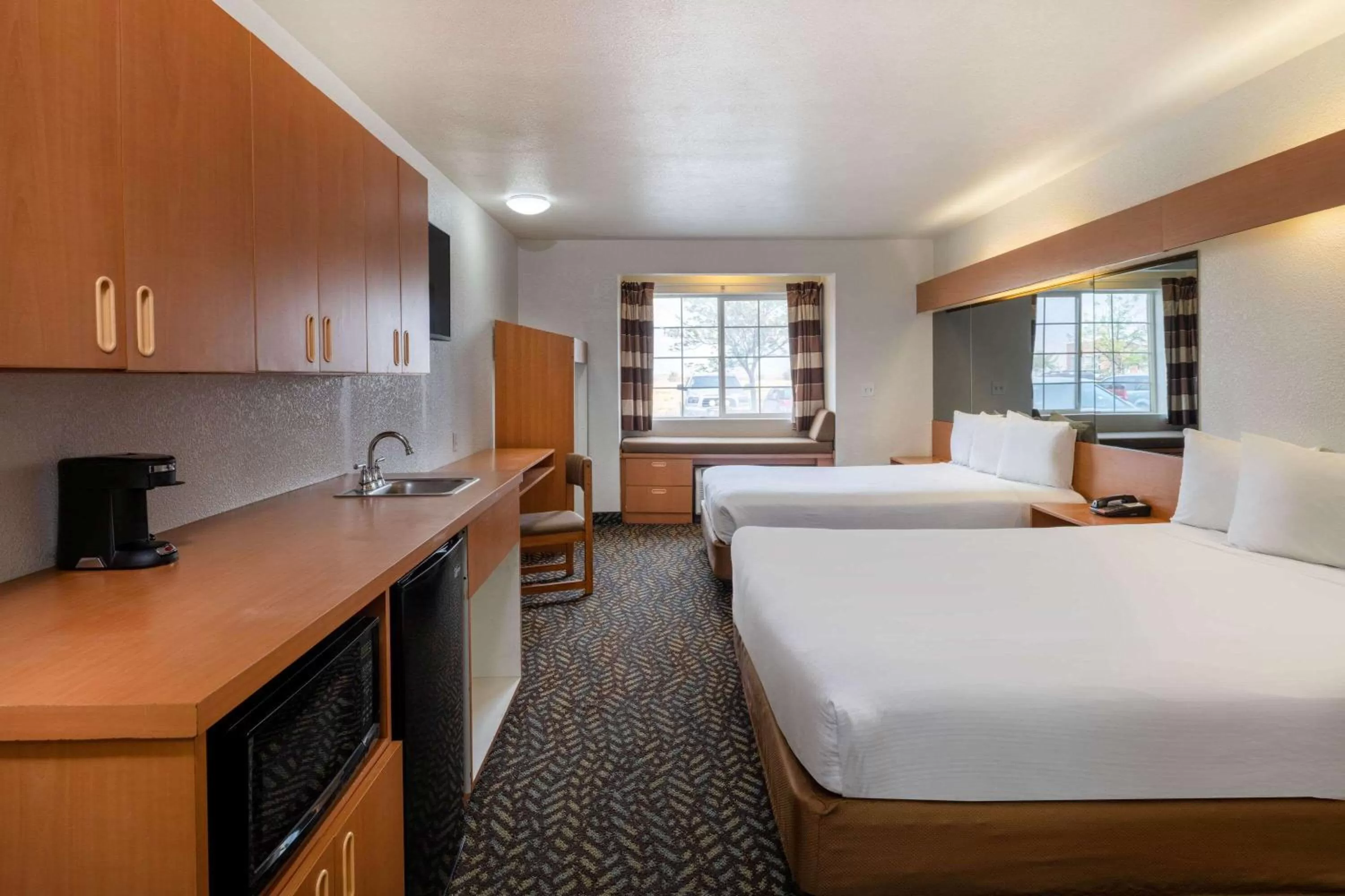 Photo of the whole room, Bed in Microtel Inn & Suites by Wyndham Salt Lake City Airport