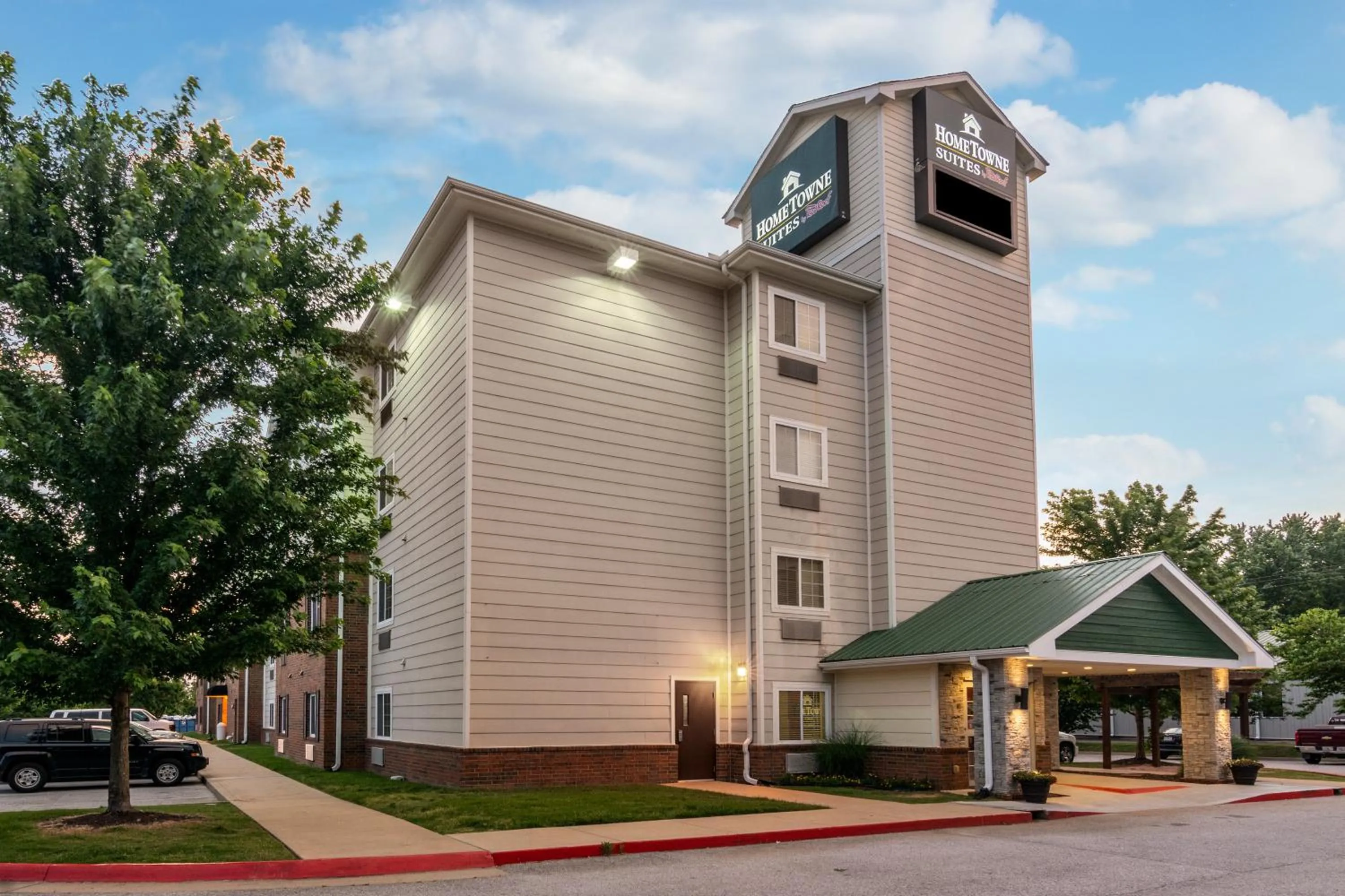 Property building in HomeTowne Studios & Suites by Red Roof Bentonville