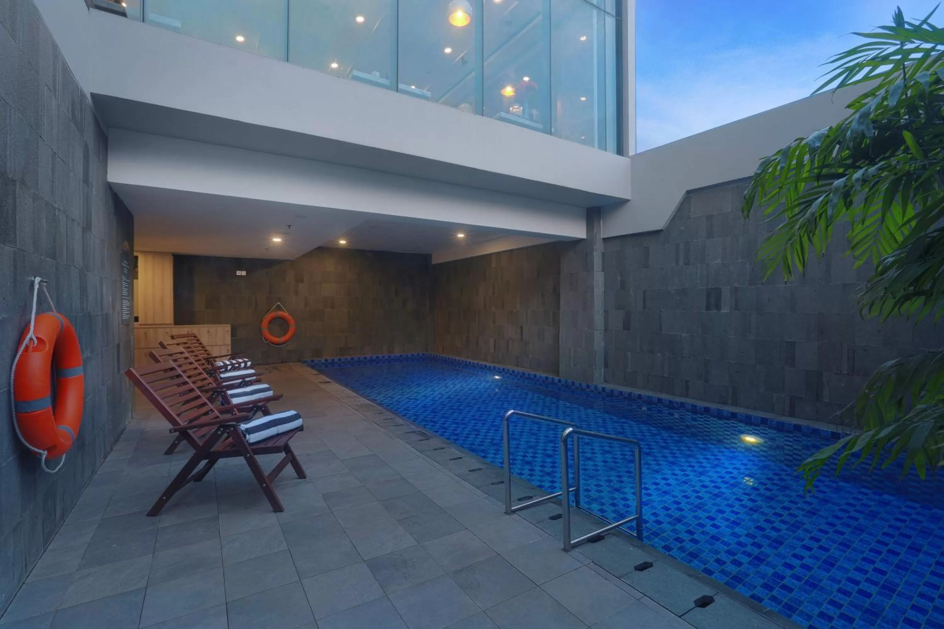 Swimming pool in Harper Cikarang by ASTON