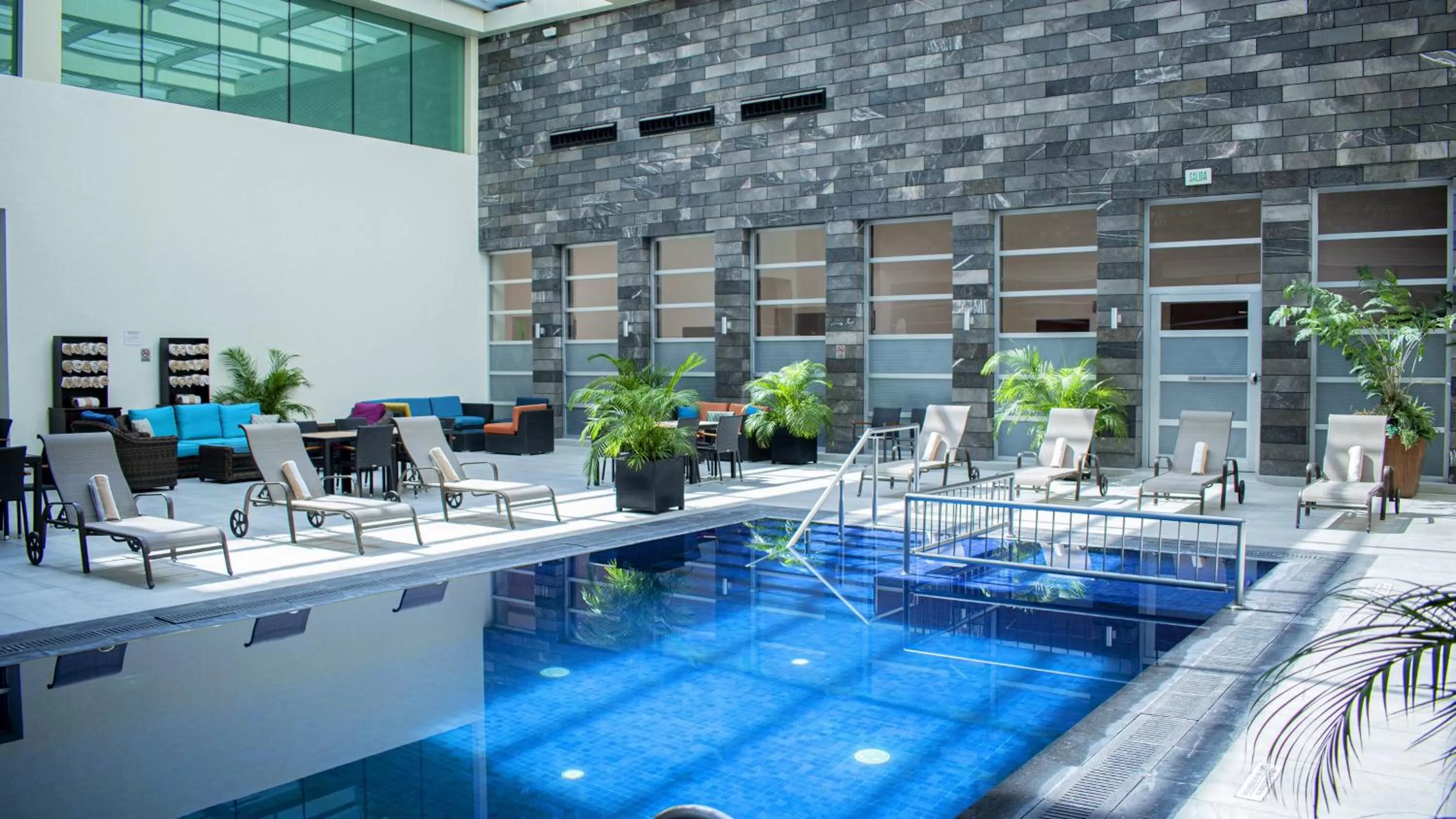 Swimming pool in Holiday Inn & Suites Plaza Mayor by IHG