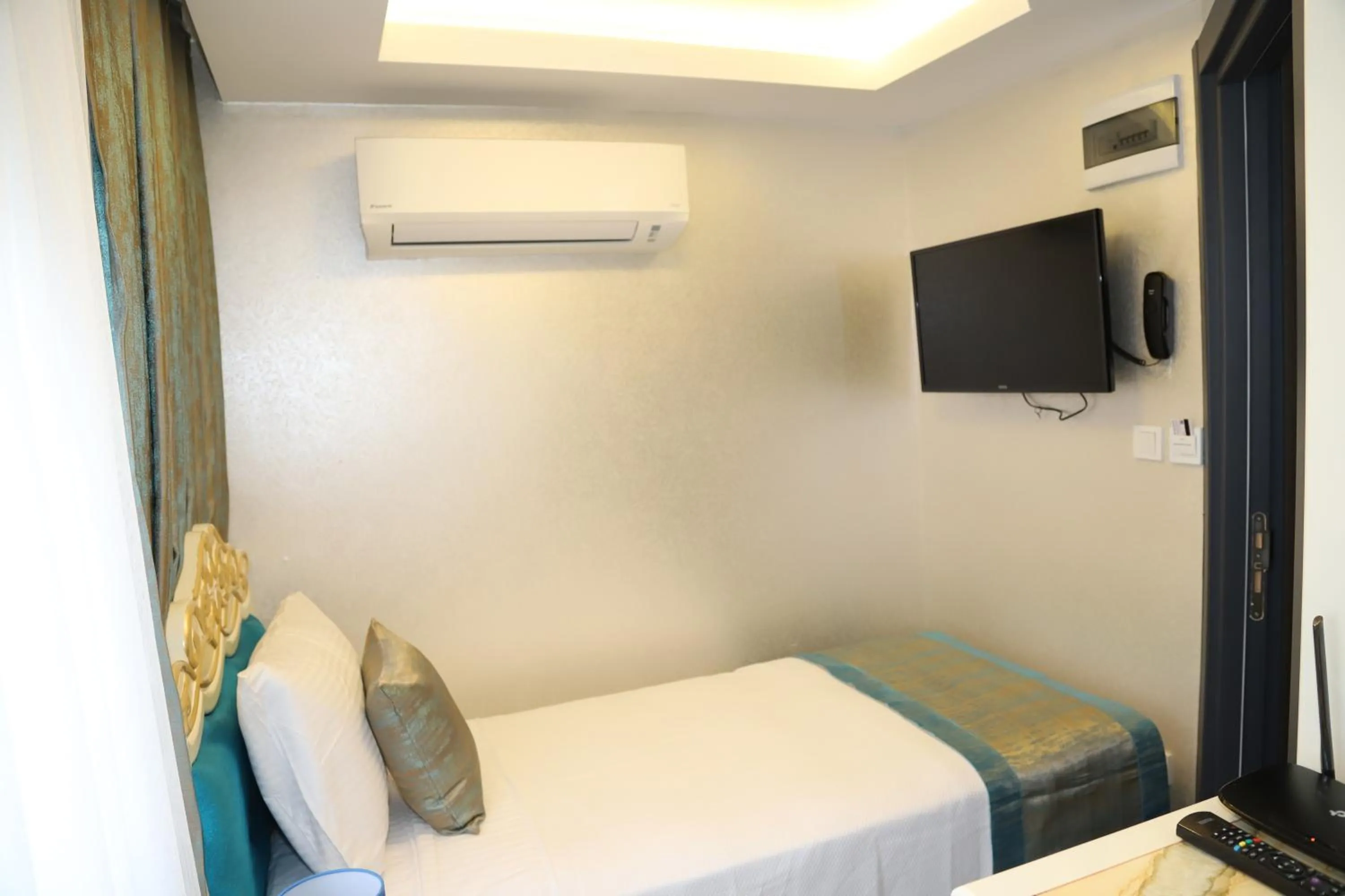 Bed in Grand Kavi Hotel