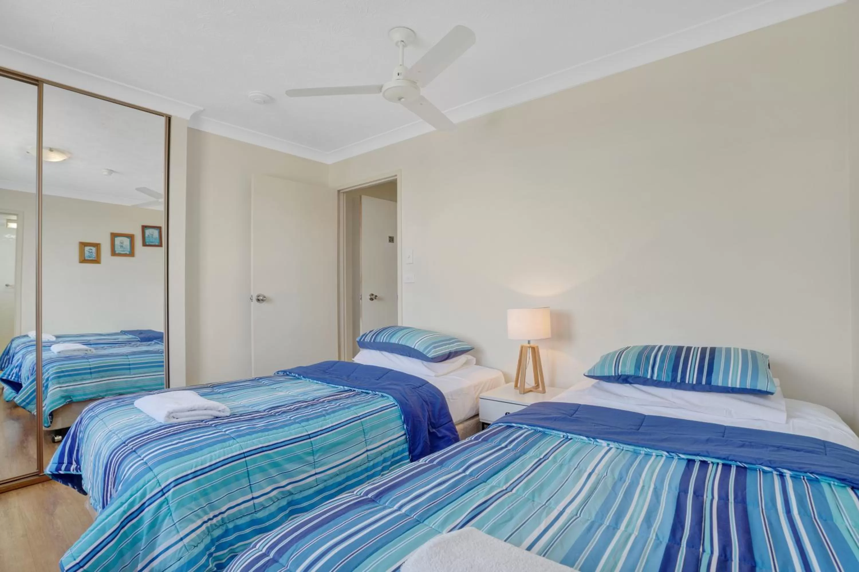 Bed in Beach Palms Holiday Apartments