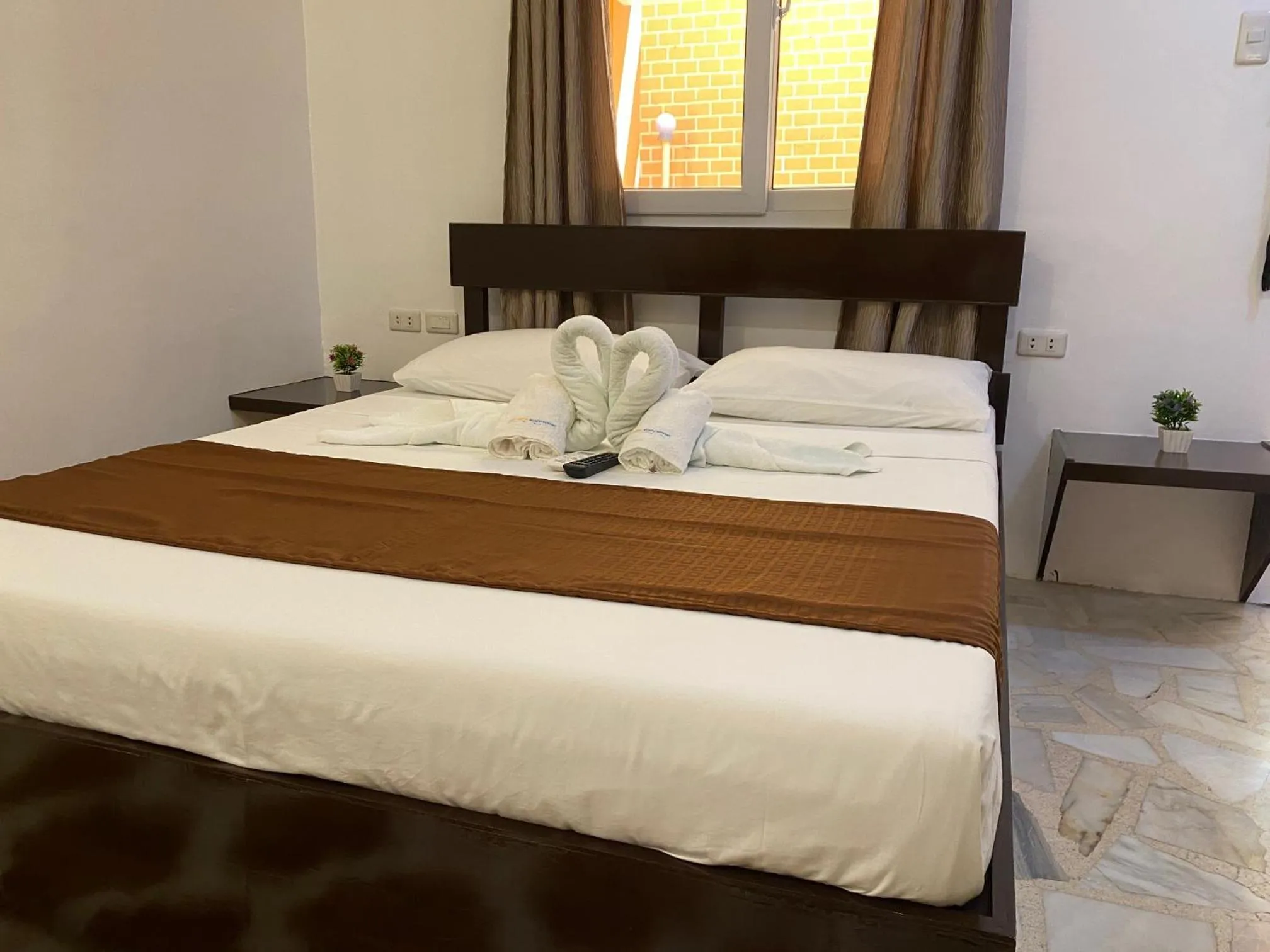 Bed in Papa Freds Beach Resort