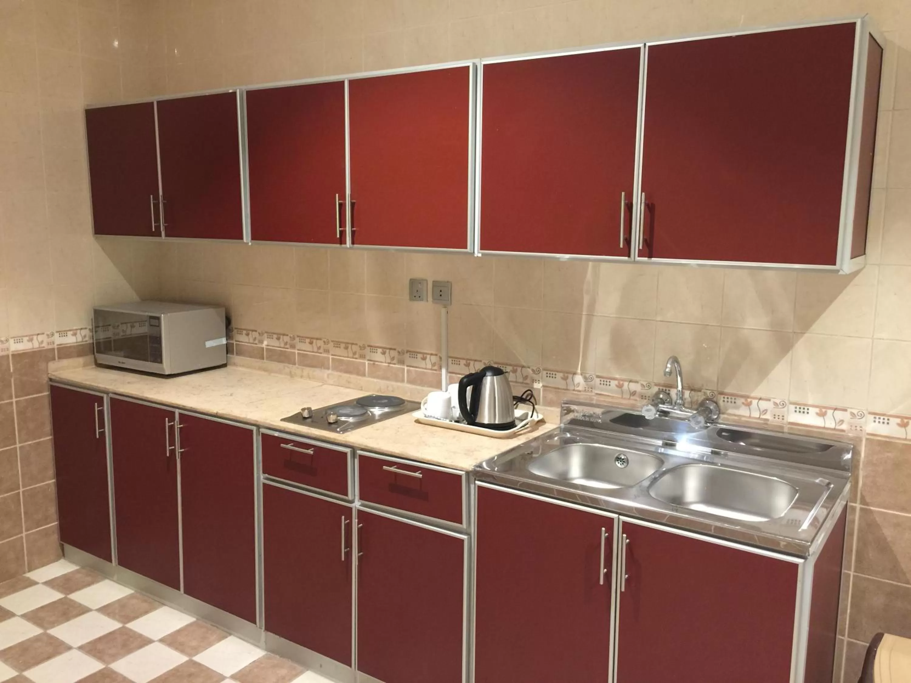 Kitchen/Kitchenette in Alshaheen Suites