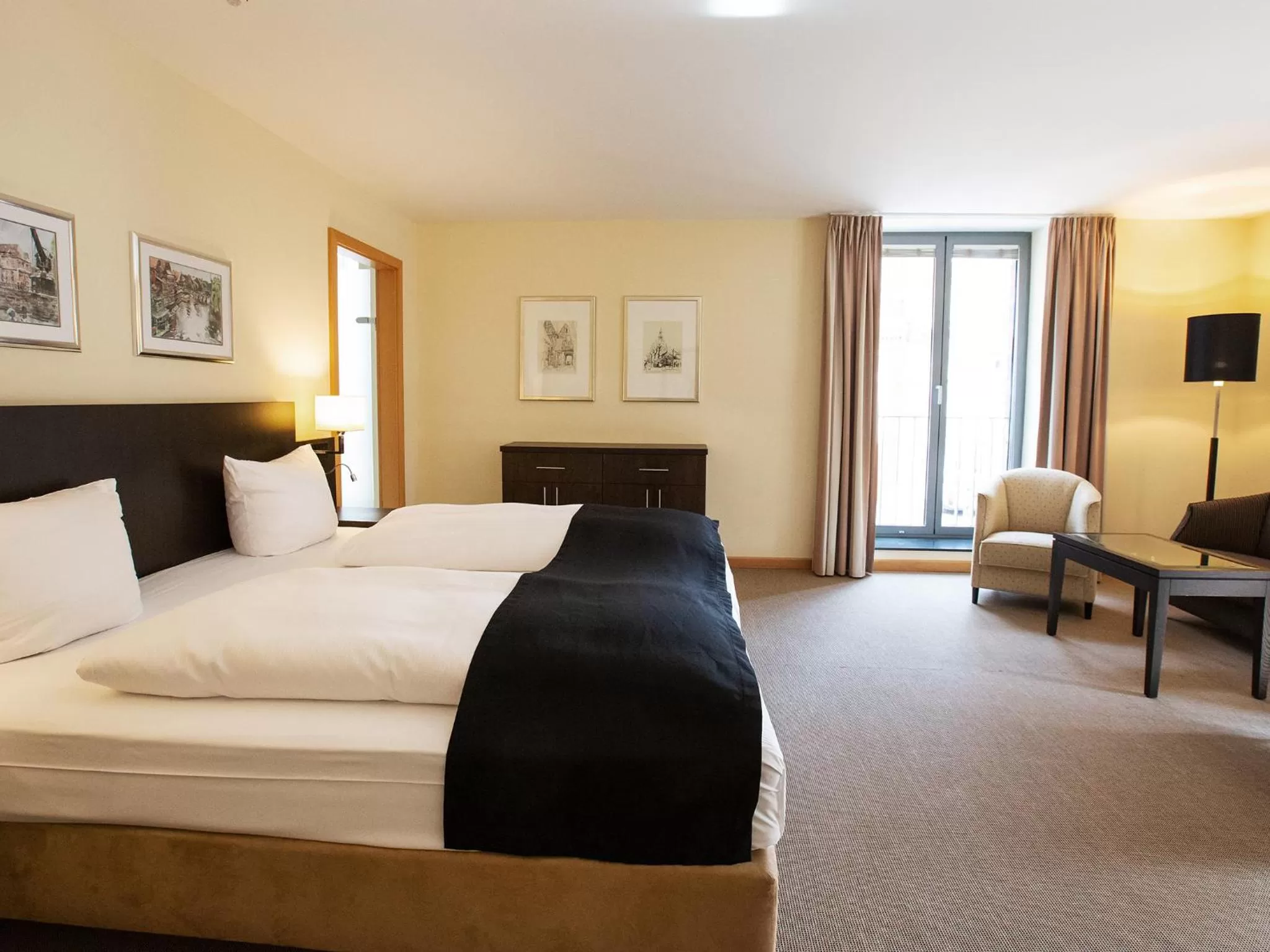 Photo of the whole room, Bed in DORMERO Hotel Altes Kaufhaus Lüneburg