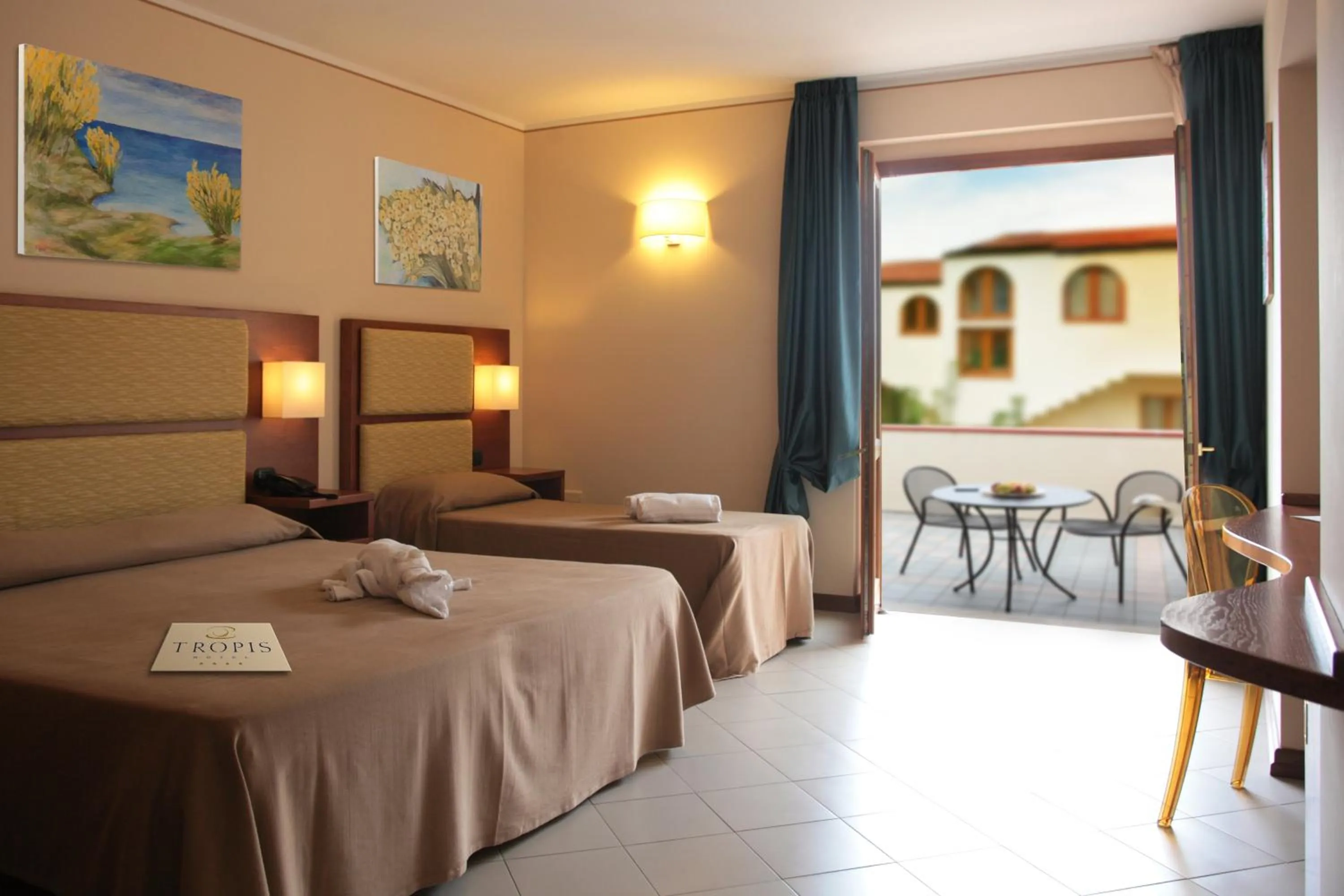 Photo of the whole room, Bed in Tropis Hotel