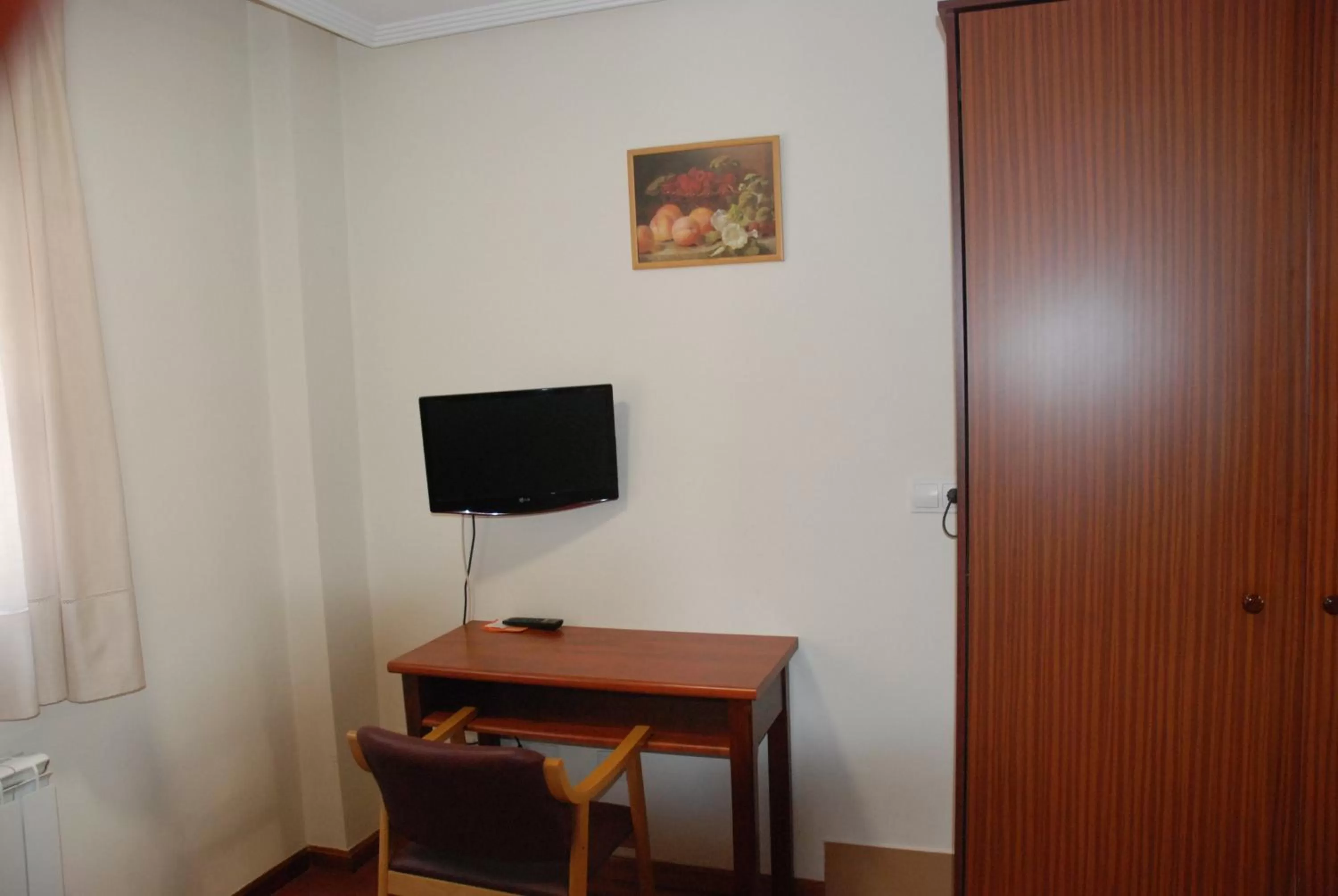 TV/Entertainment Center in Apartahotel FC Catedral