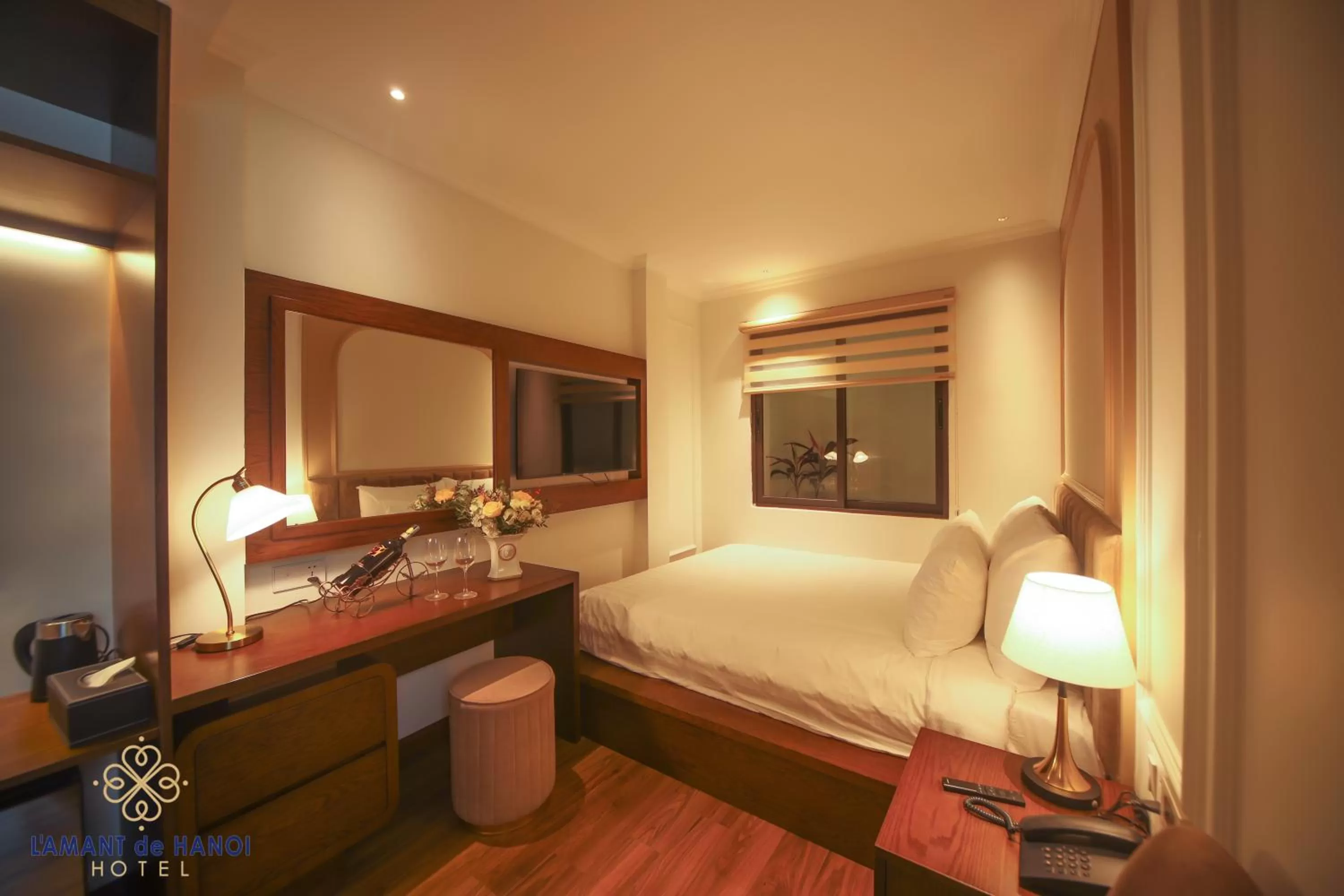 Bed in L'amant de Hanoi Hotel - khách sạn Lamant de Hà Nội