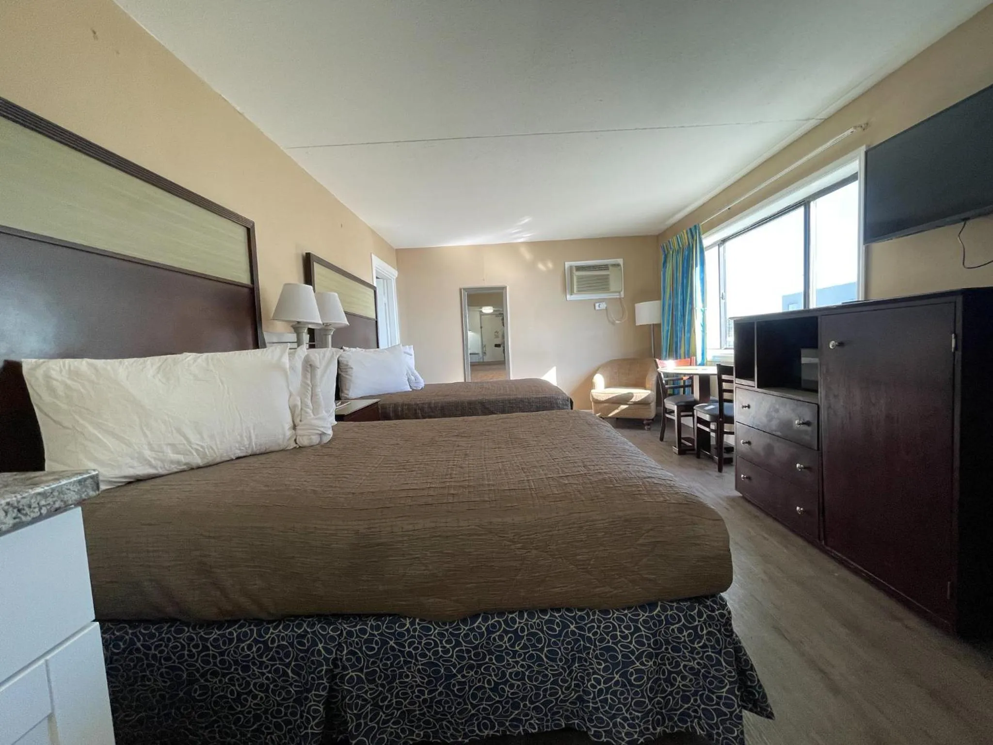 Bed in Polynesian Oceanfront Hotel