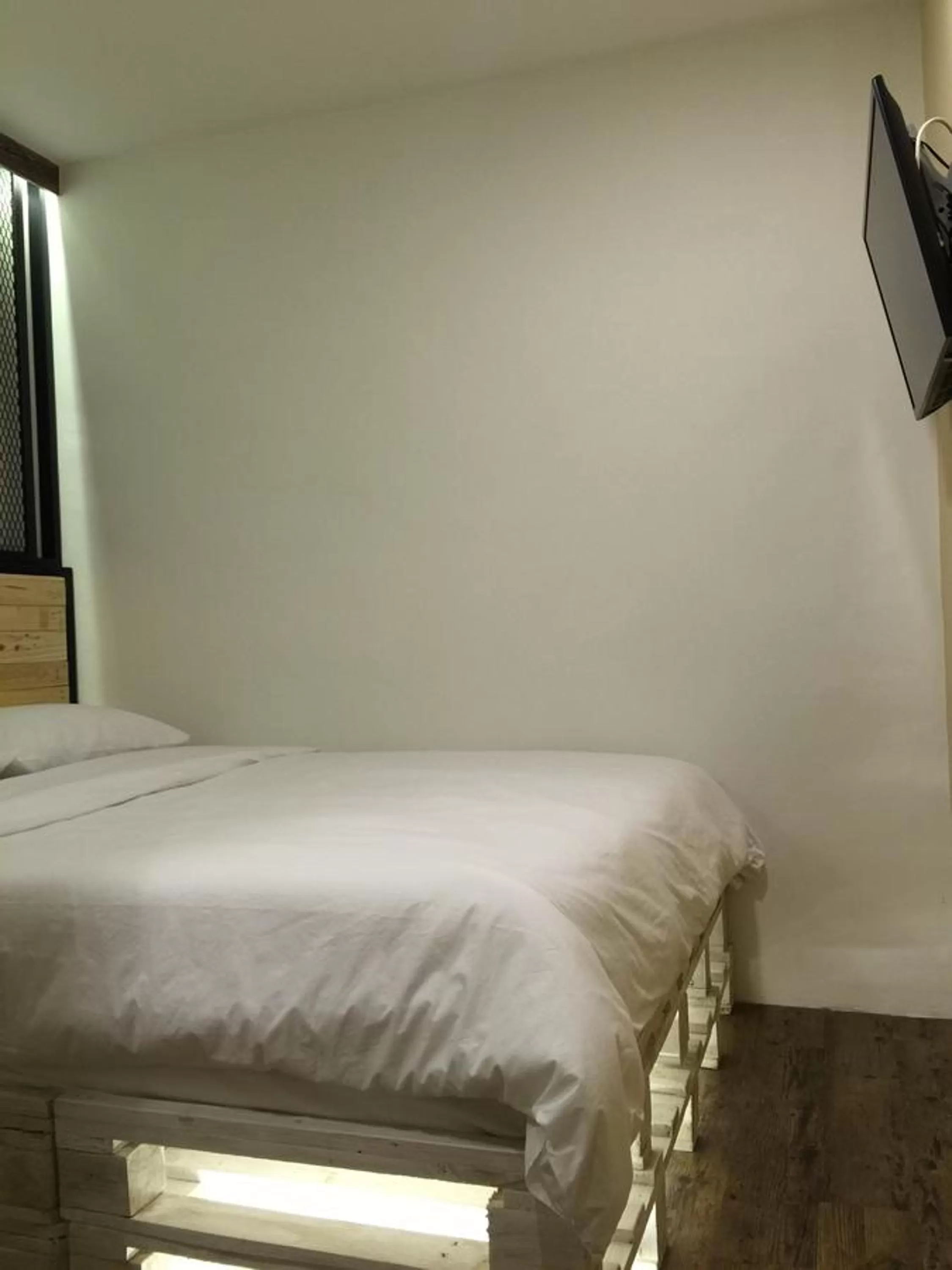 Bed in The Oikos Hotel