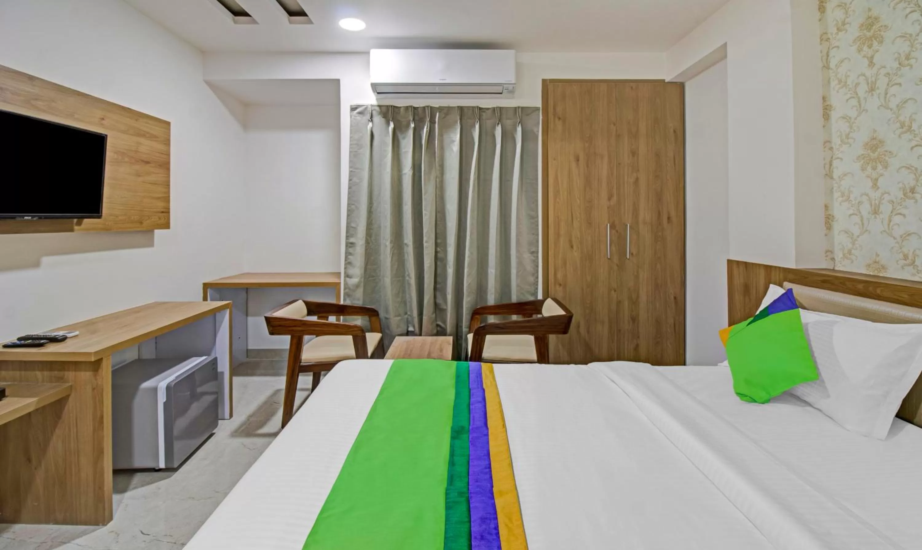Bedroom, Bed in Treebo Chandraprasth Residency
