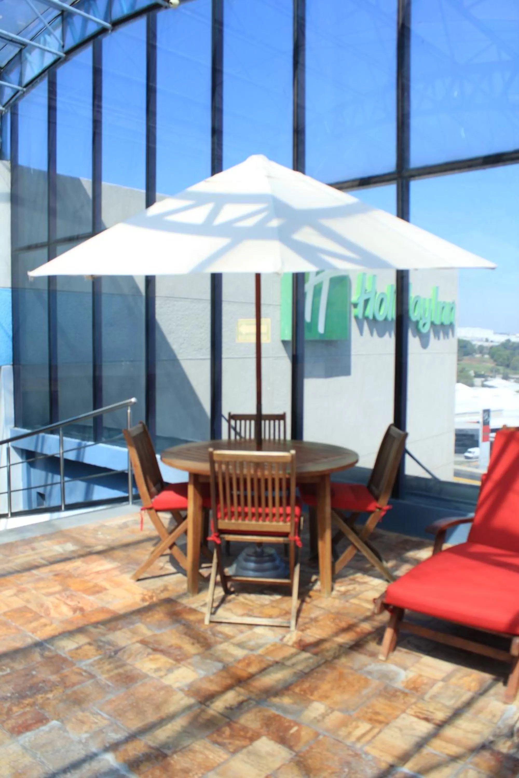 Swimming pool in Holiday Inn Puebla Finsa by IHG