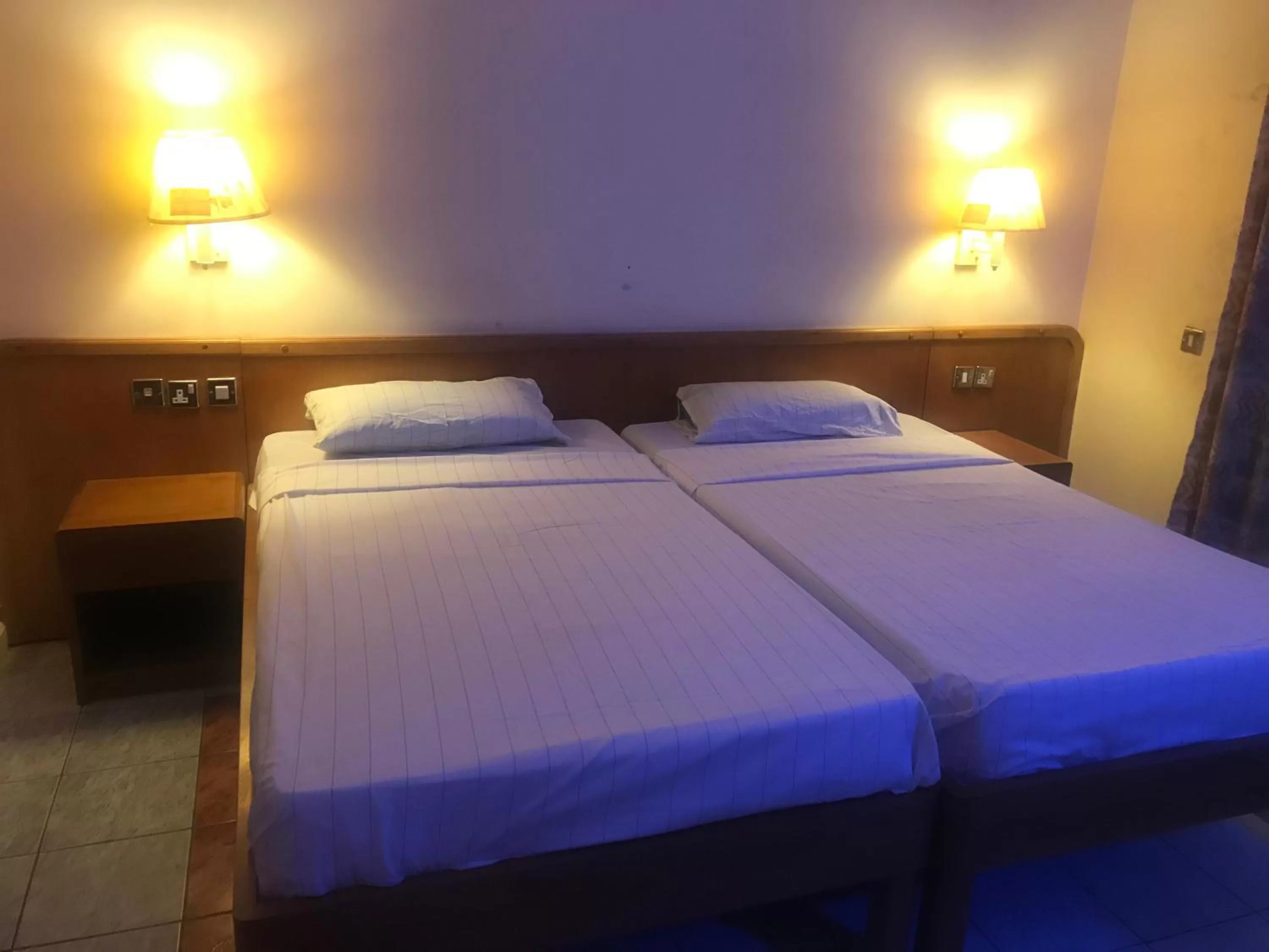 Bed in Maple Leaf Korean Hotel