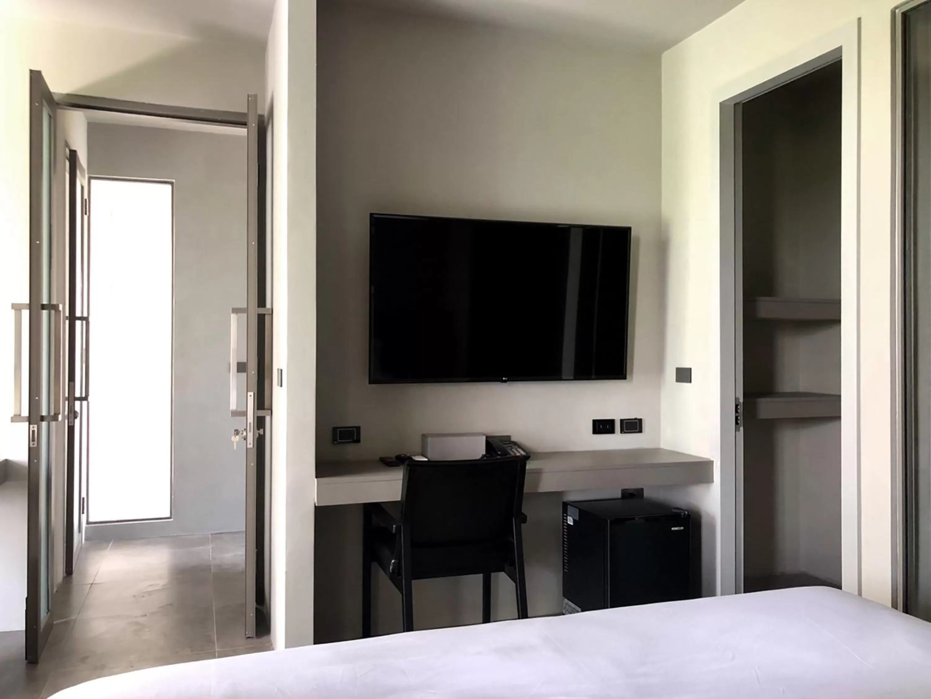 TV and multimedia, Bed in Doowall Hotel