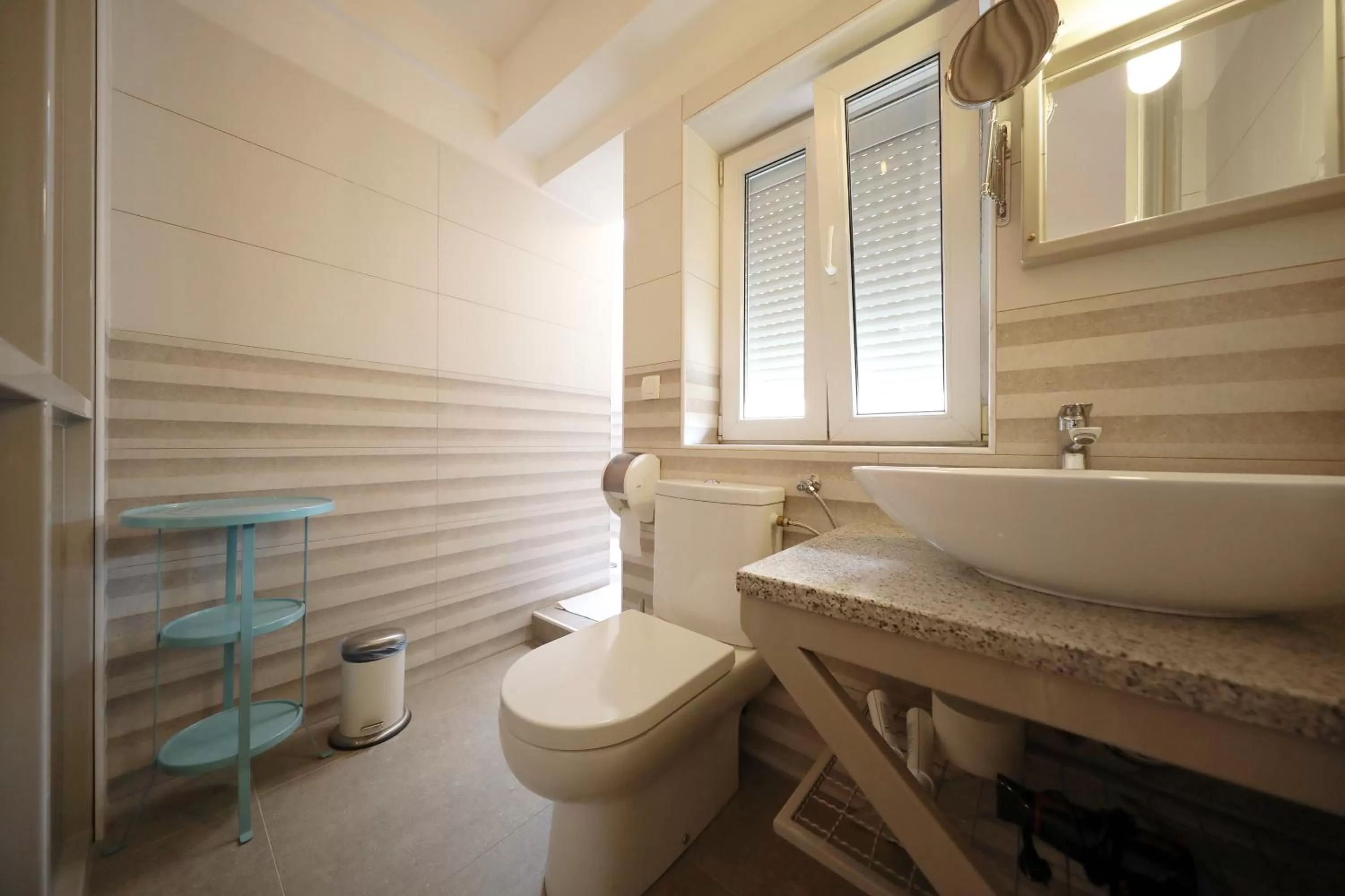 Toilet in Central Apartments Integrated Hotel