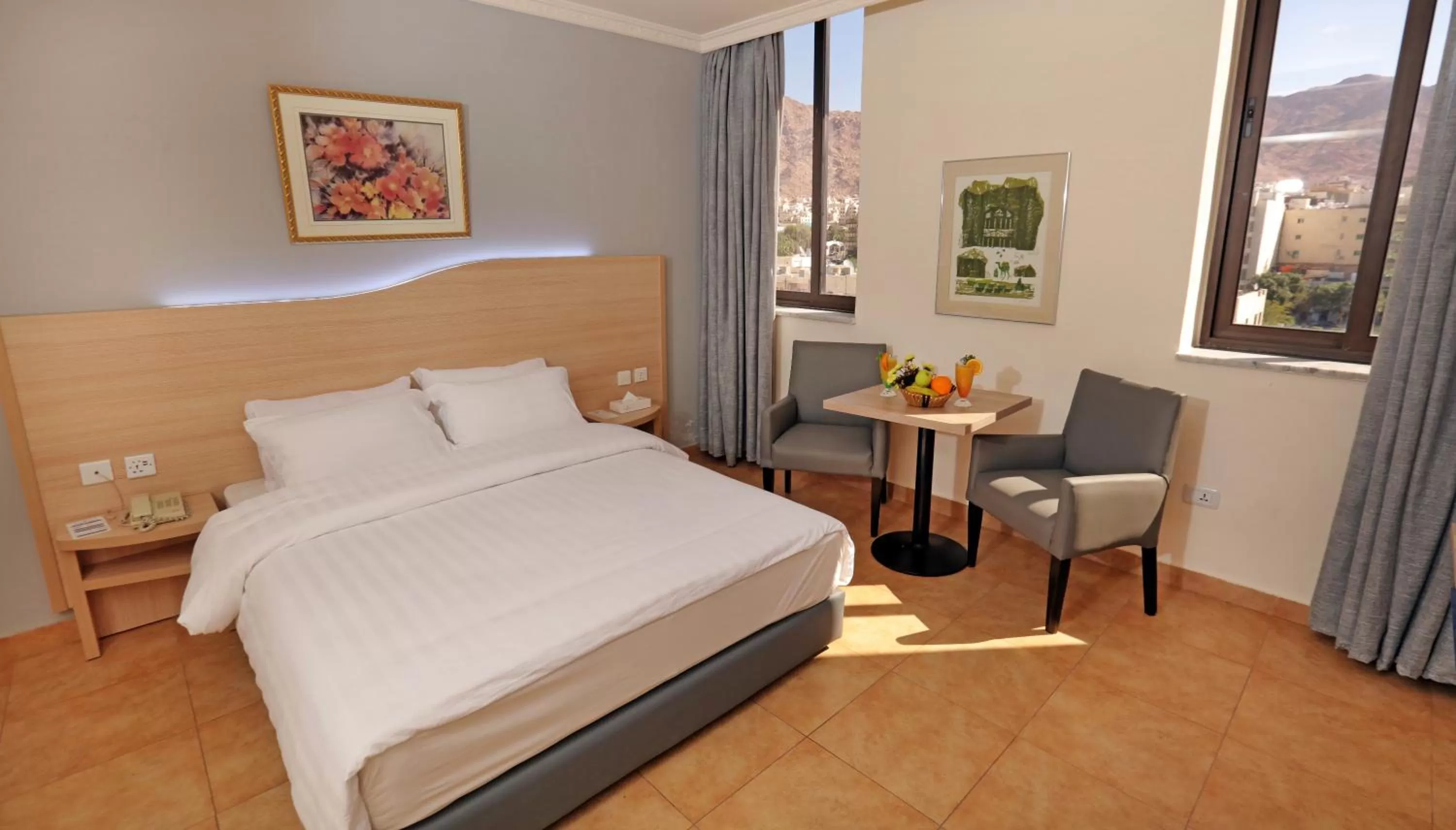 Photo of the whole room, Bed in Golden Tulip Aqaba