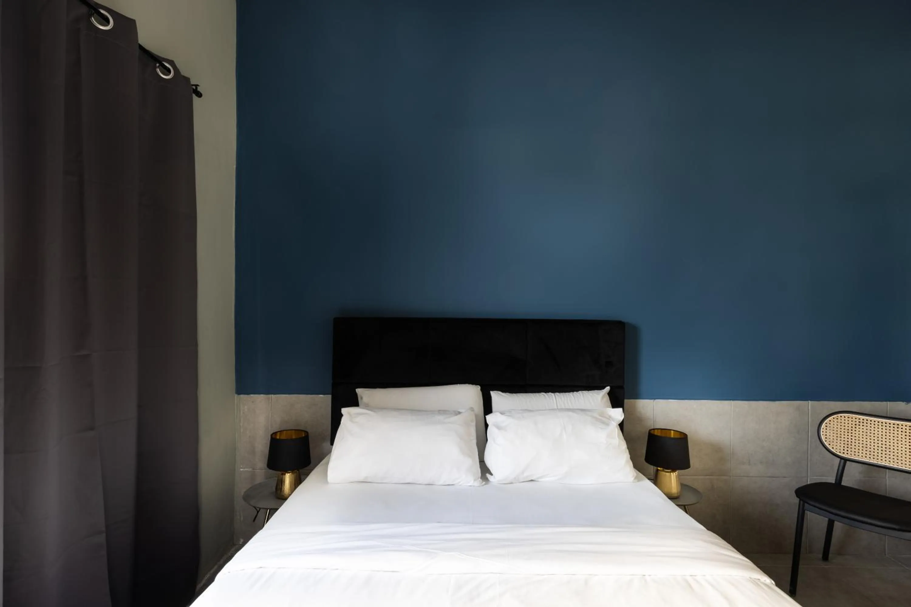 Bed in Liber Tel Aviv Sea Shore Suites BY RAPHAEL HOTELS