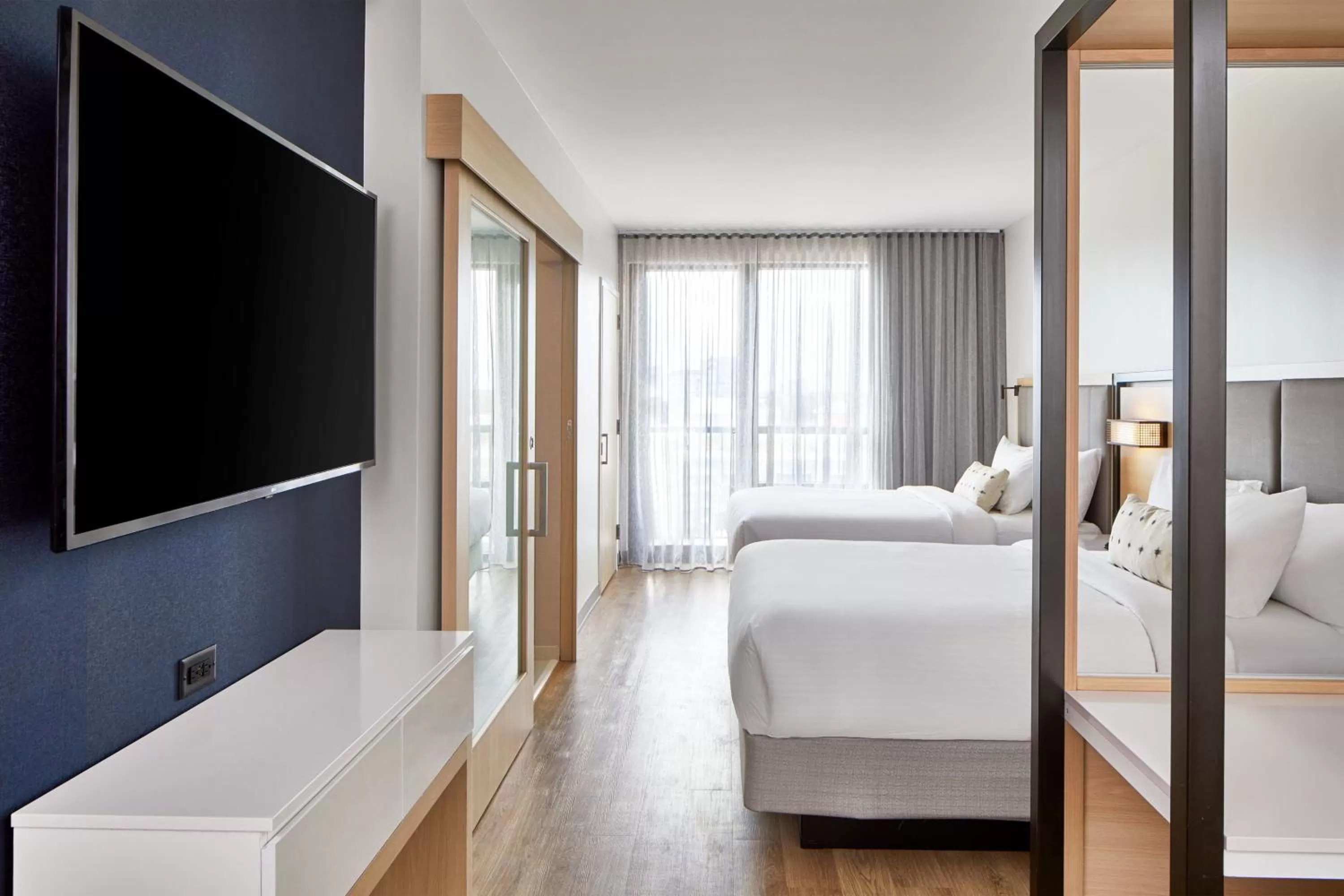 Photo of the whole room, Bed in SpringHill Suites by Marriott Jacksonville Beach Oceanfront