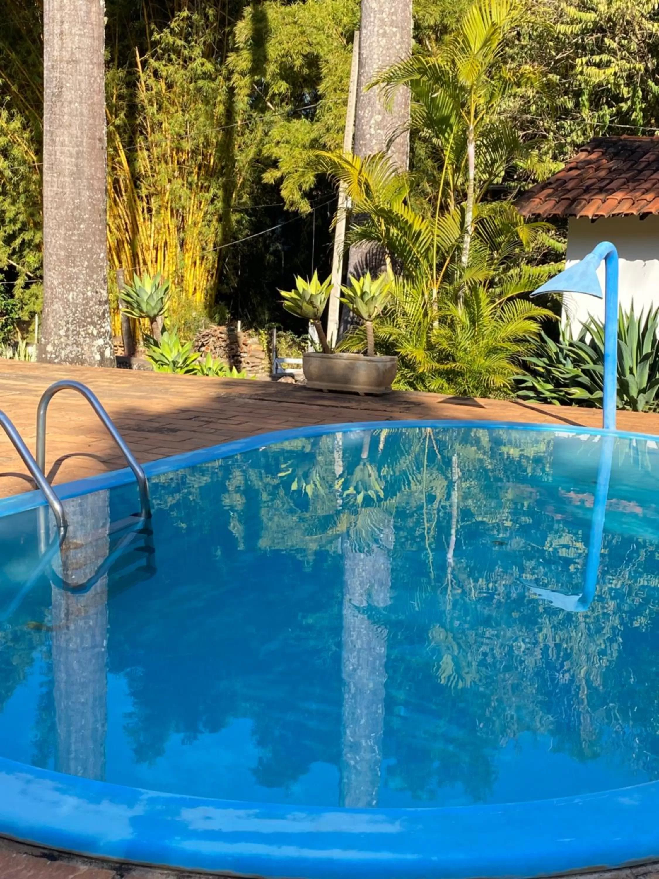 Swimming Pool in Pousada Cantinho do Mundo