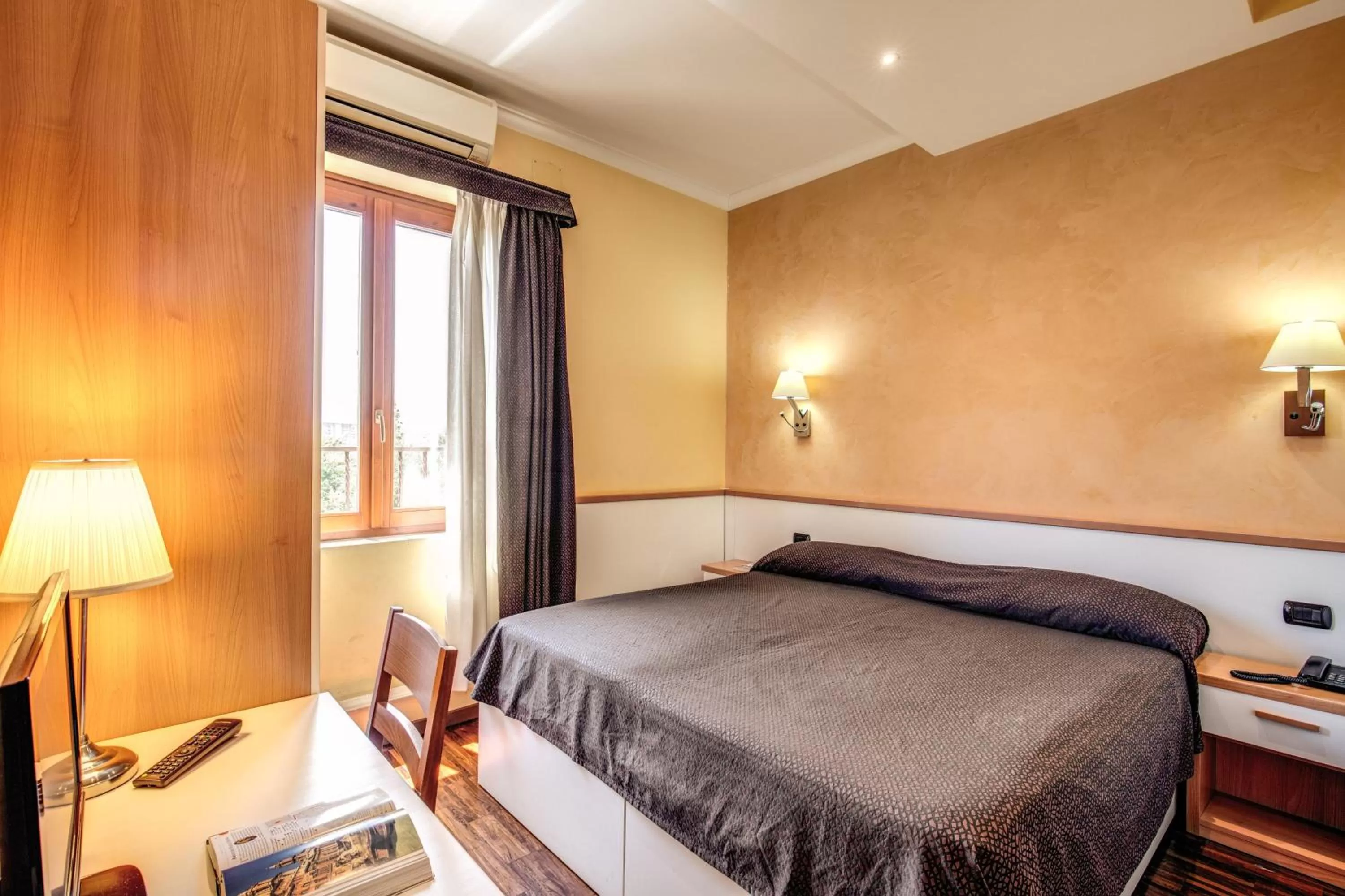 Photo of the whole room, Bed in Hotel Roma Tiburtina Metro