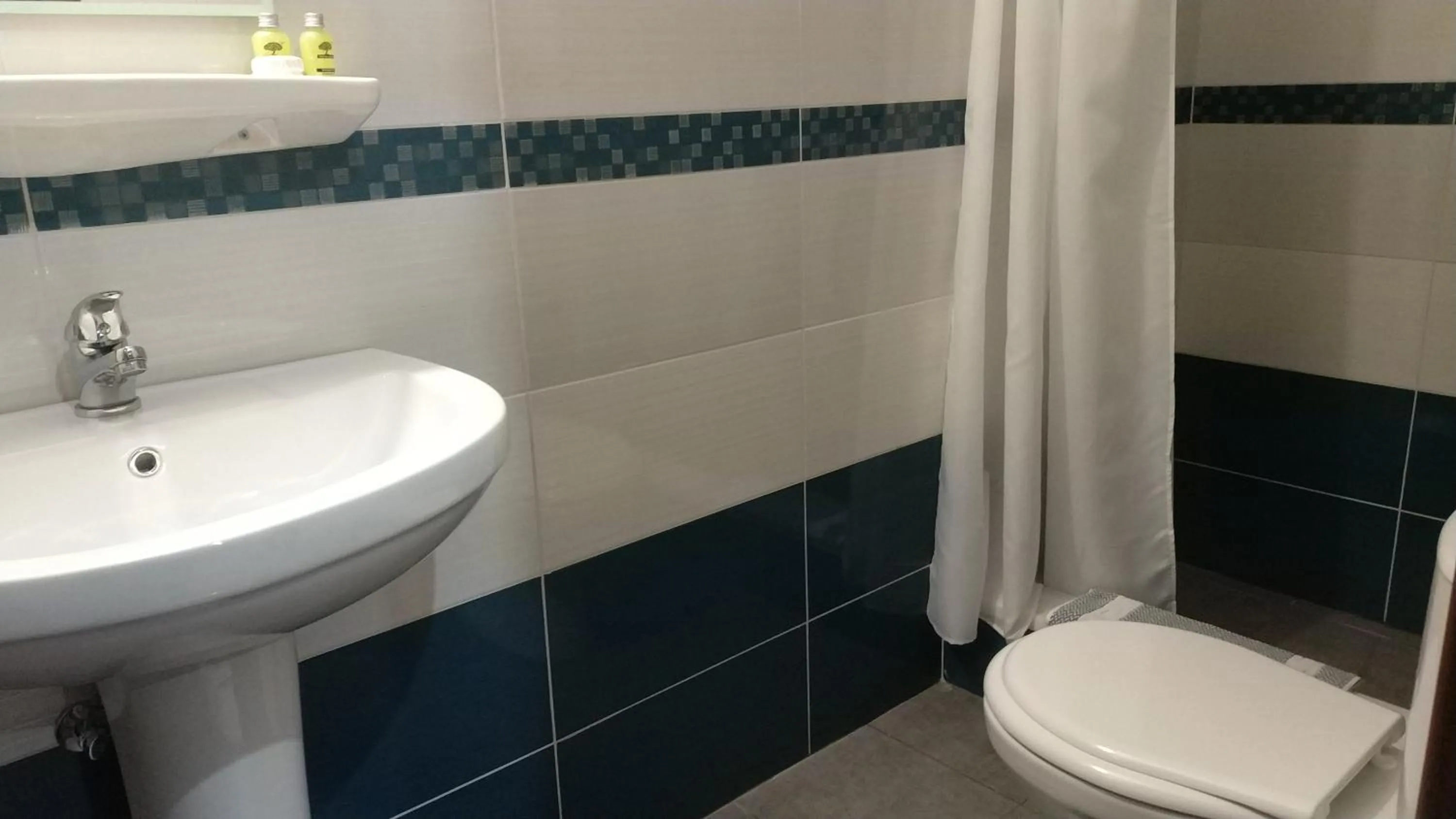 Bathroom in Ambrosia Suites