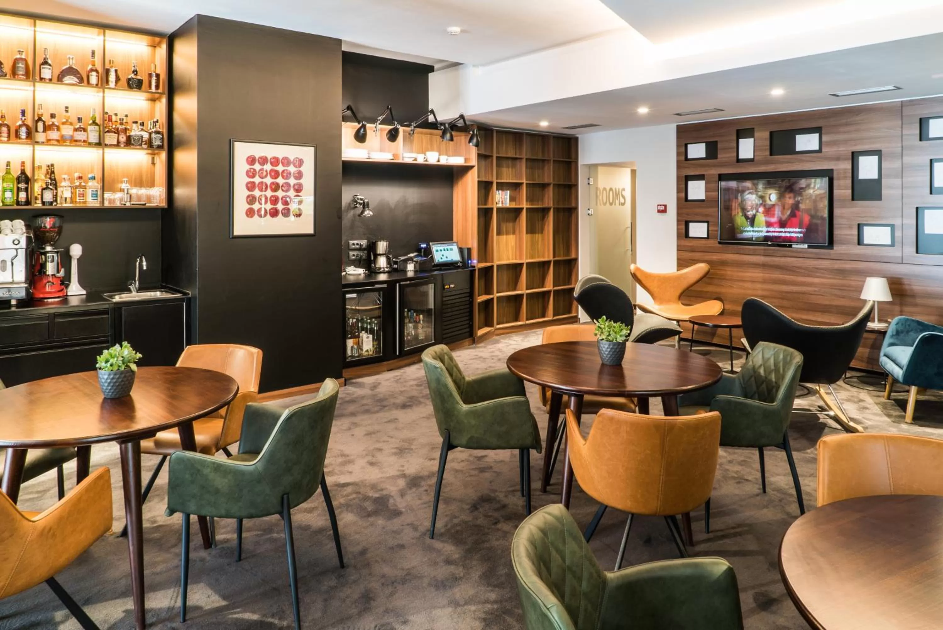 Communal lounge/ TV room in Best Western Premier Natalija Residence