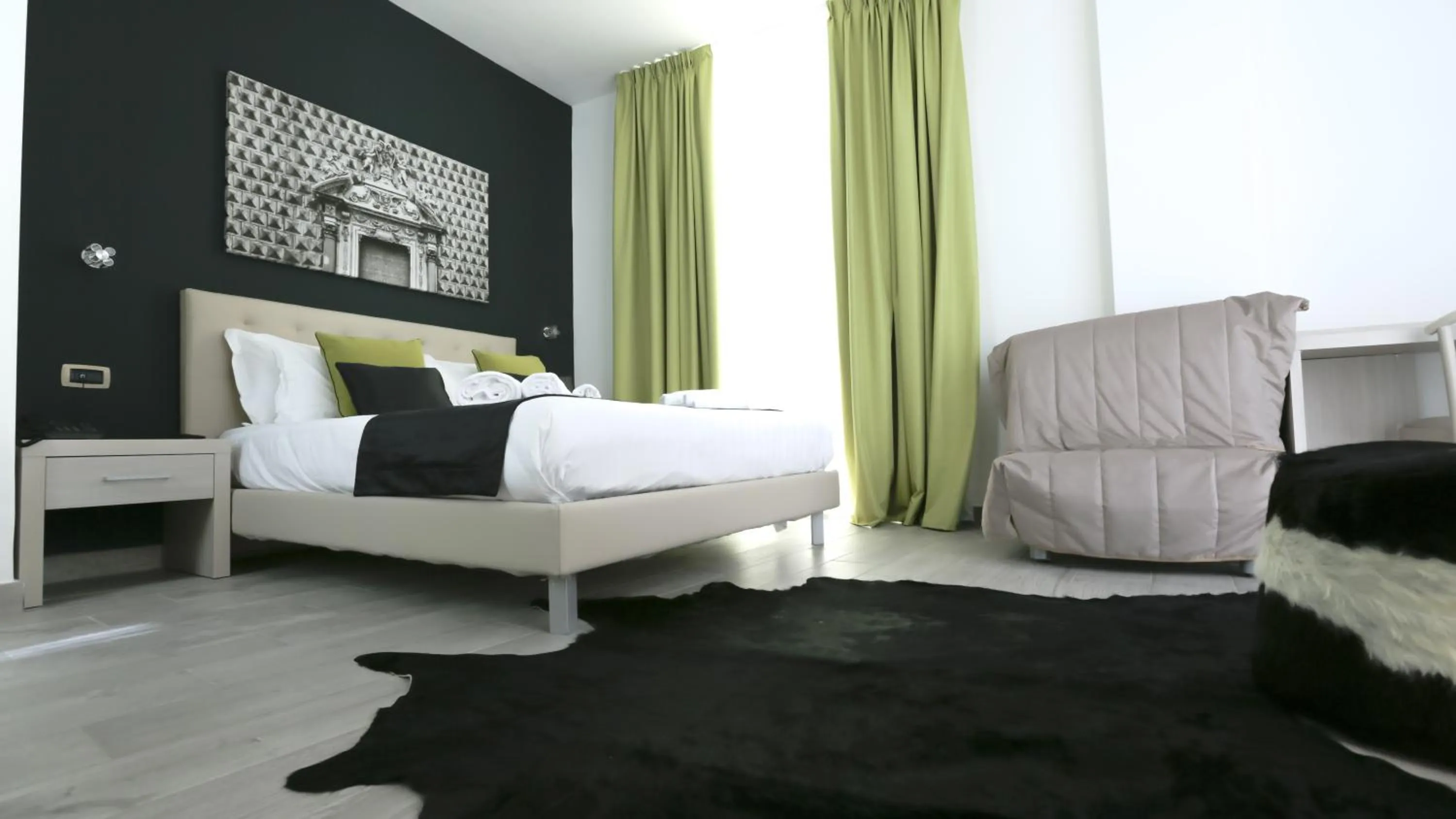 Photo of the whole room, Bed in Ecumano Space