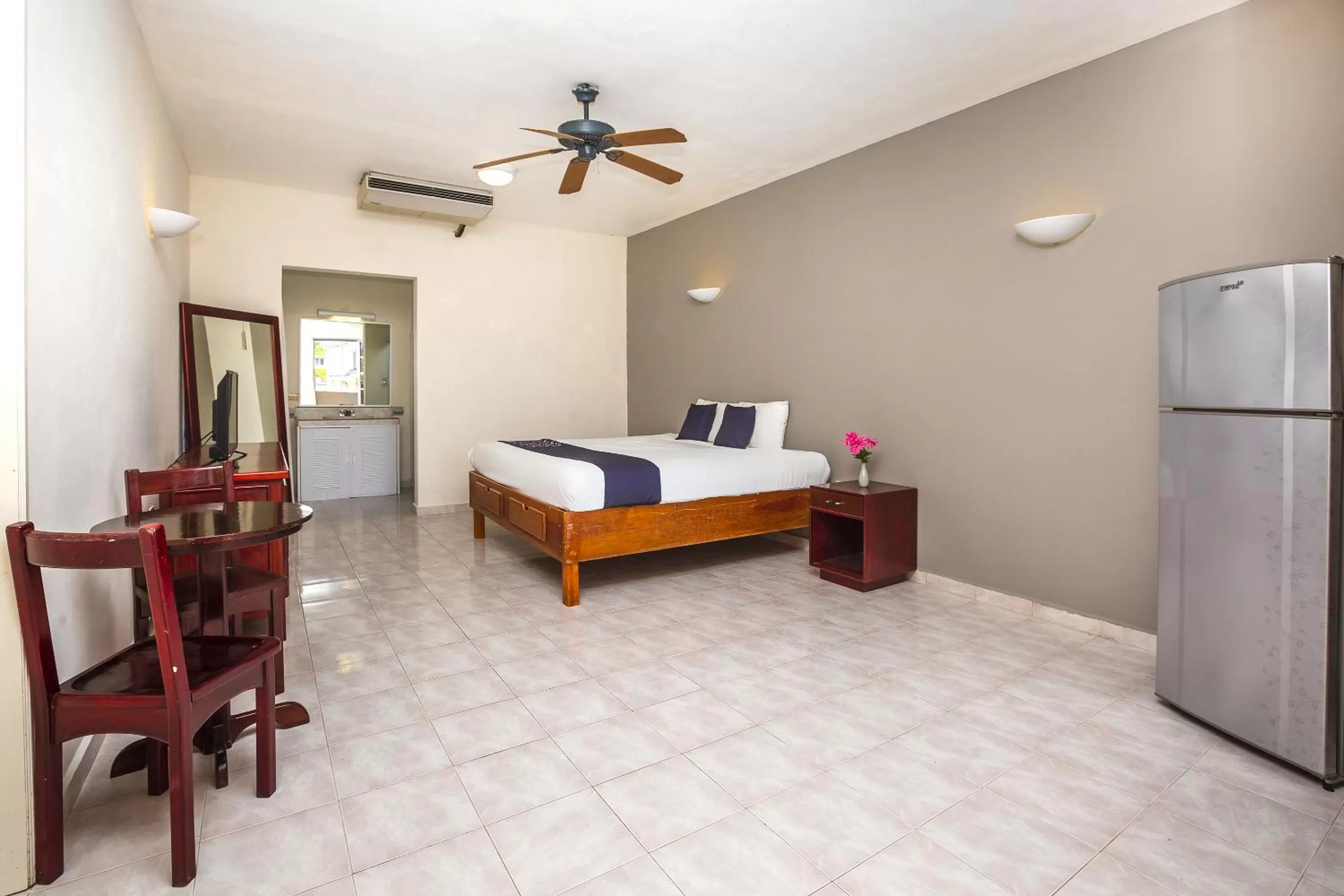 Bed in Hotel Kiin Cozumel